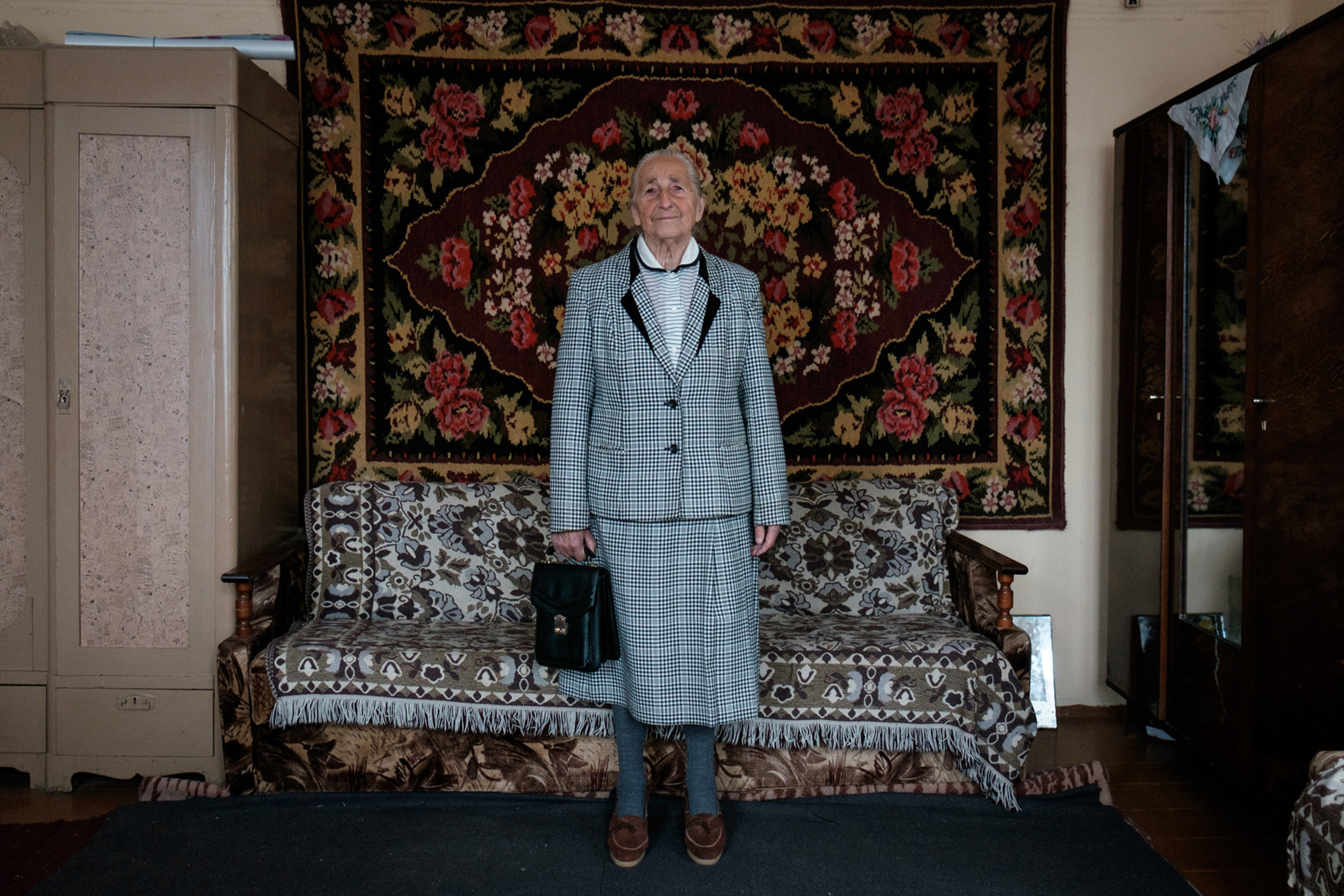 The costume that Vera bought in the second-hand for the granddaughter's wedding.