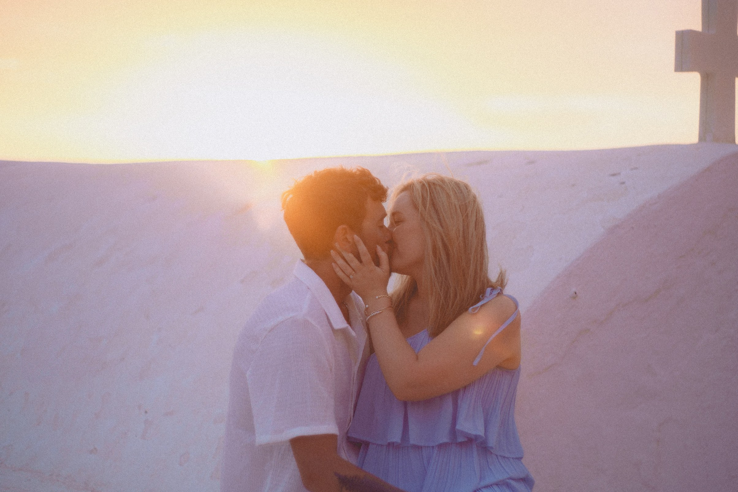 Couple sunset photoshoot in Santorini. Photographer in Greece Kristina