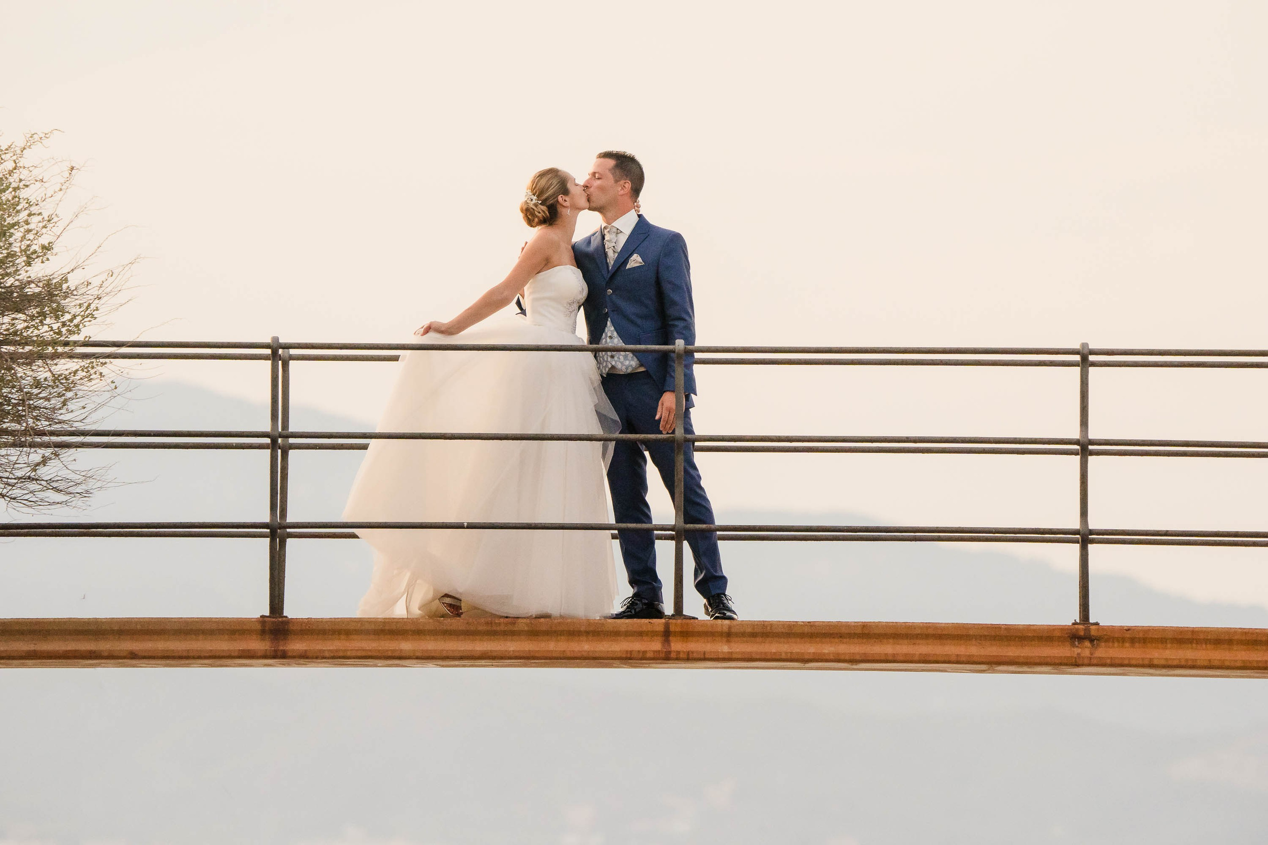 Bride and groom kiss at their Detination Wedding in Mallorca at Cap Rocat Venue
