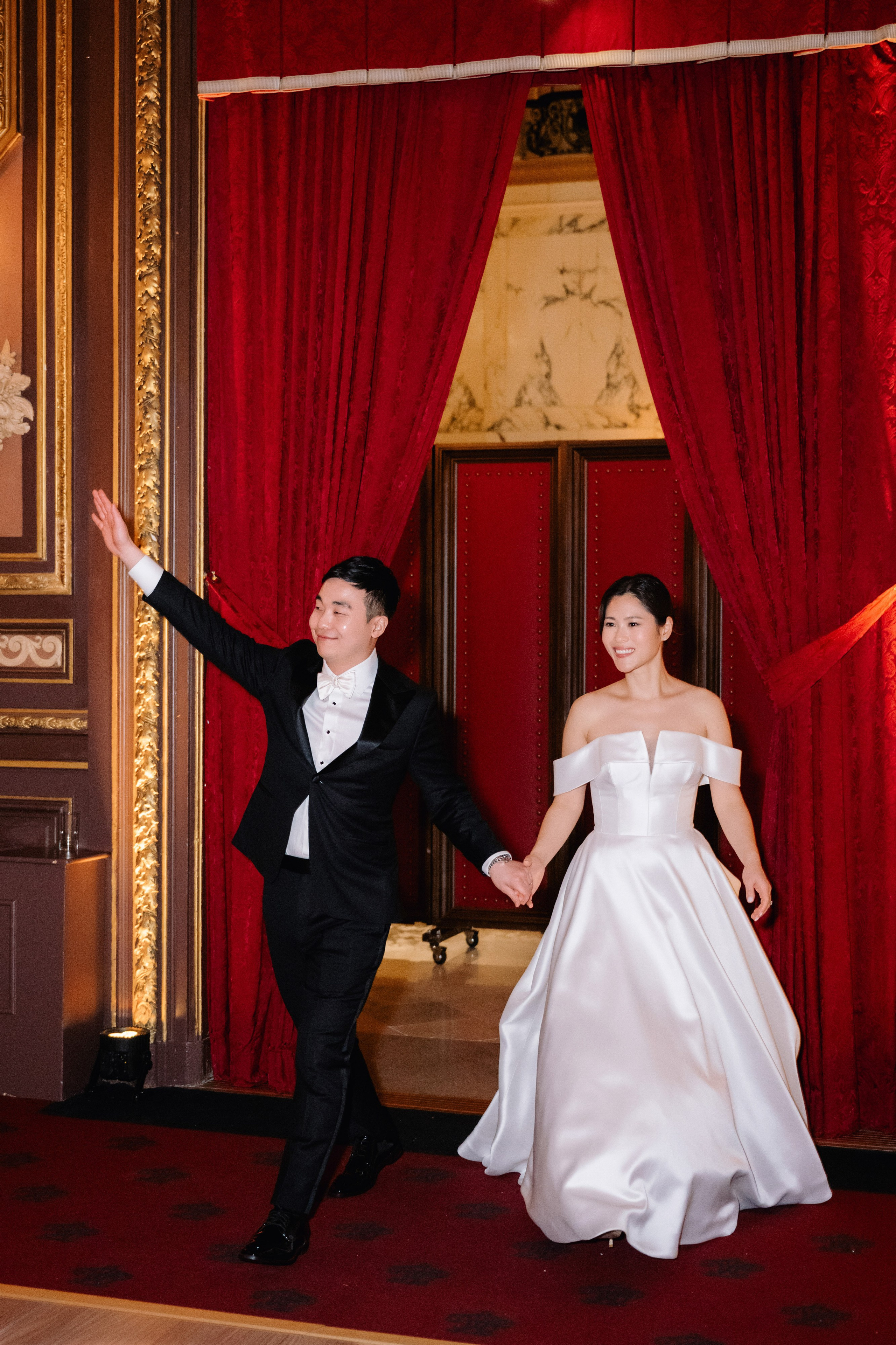 a man and woman in formal attire dancing