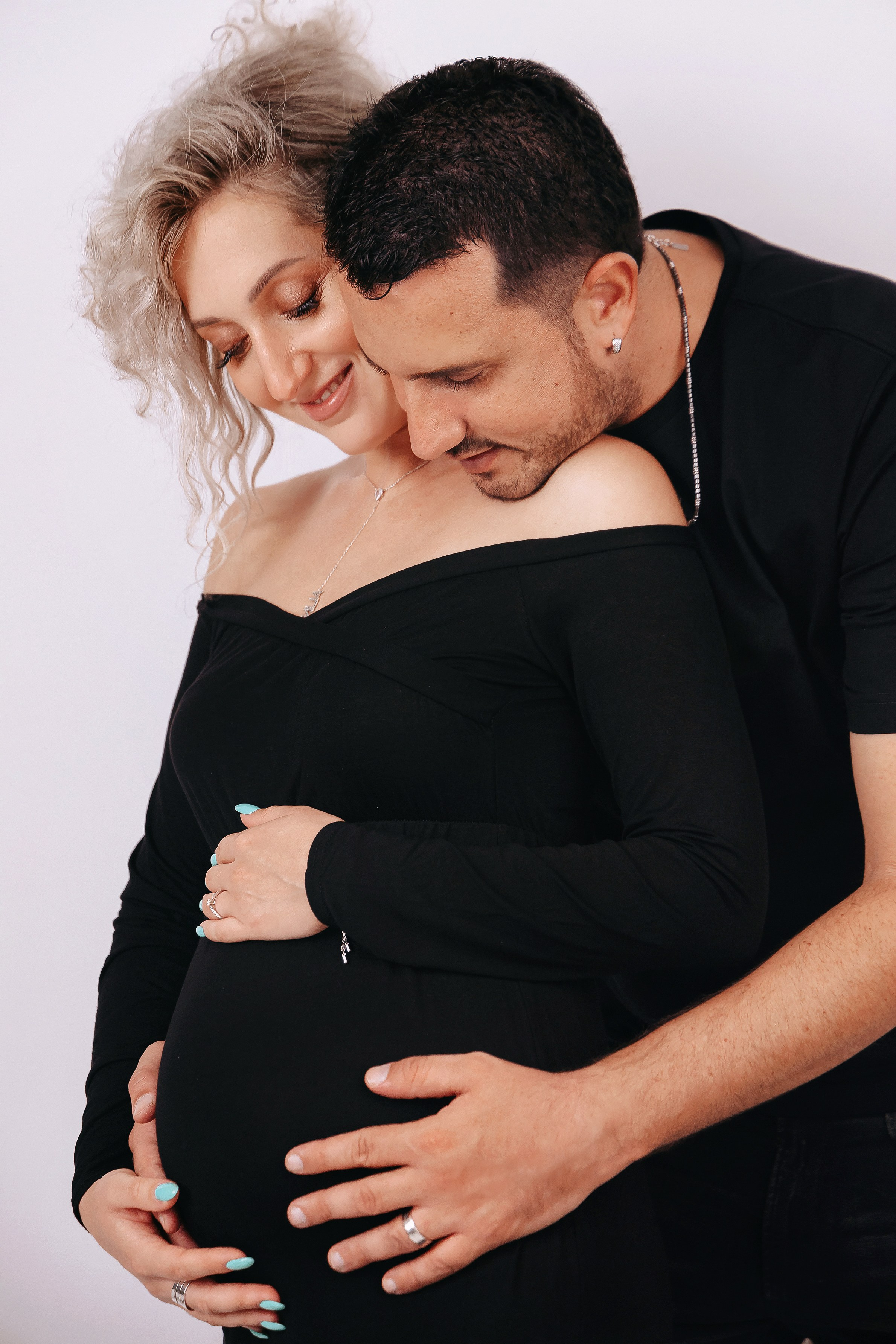 Studio pregnancy photoshooting for Alina and Michael. Home