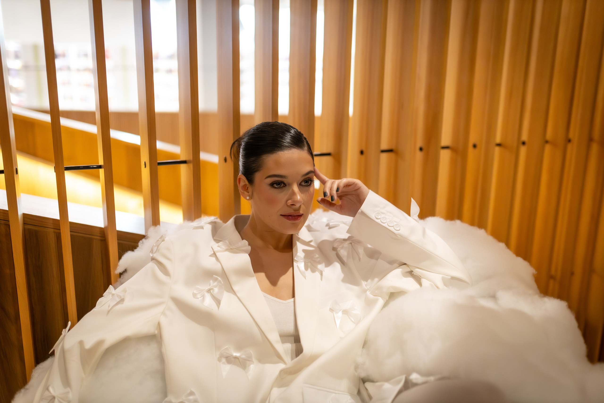 Bold & Timeless: Shelby Morisseau’s Unstoppable Elegance in White. ProFly.club — Professional aerial filming in Calgary