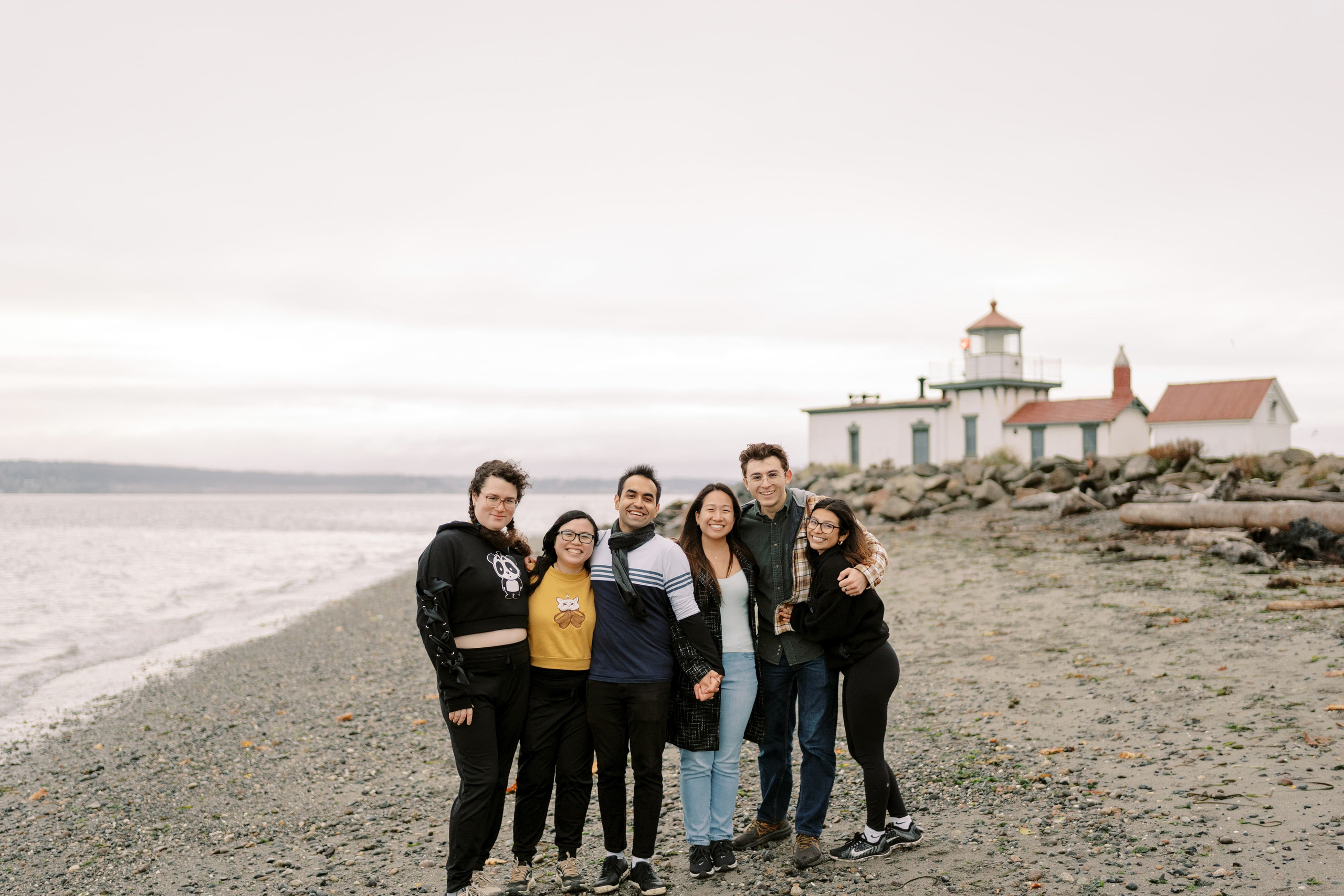 Proposal. December 2024. Alki Point Lighthouse, Washington state. EVAN ARISTOV WEDDING PHOTOGRAPHY — Seattle Wedding Photographer