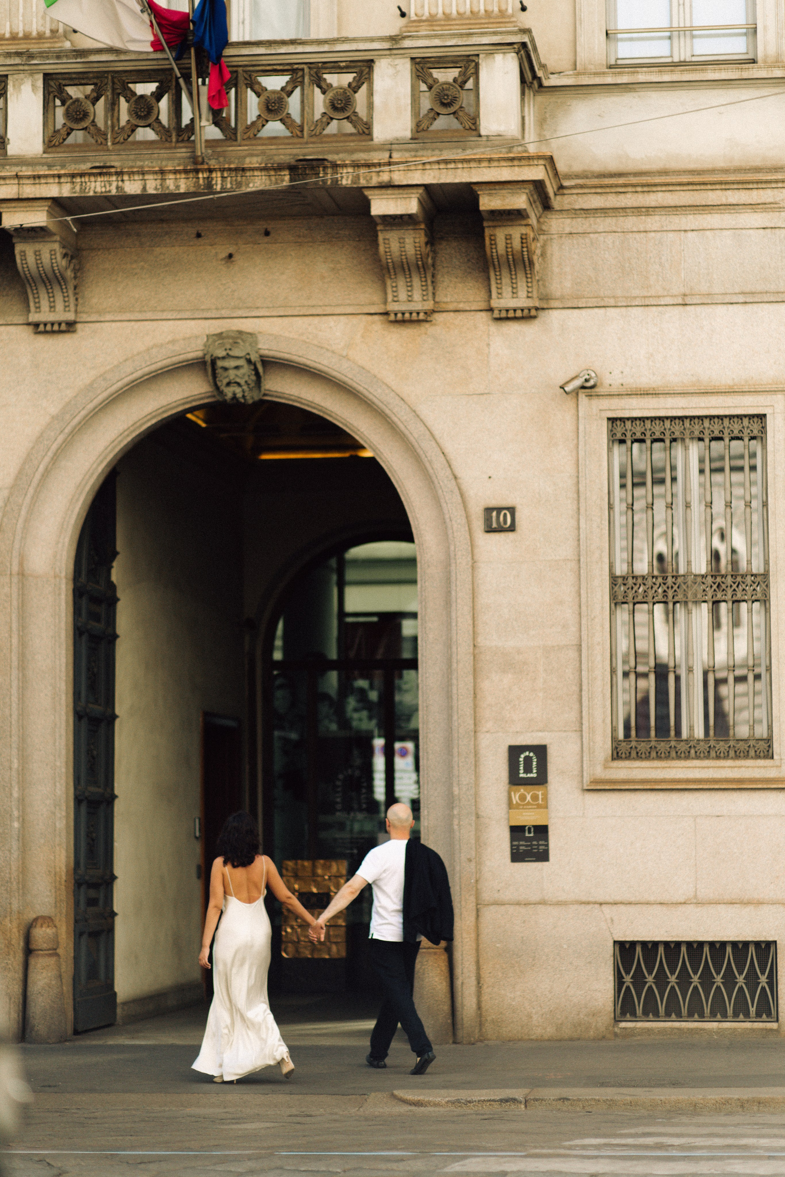 Cinematic couple portrait in Milan city streets