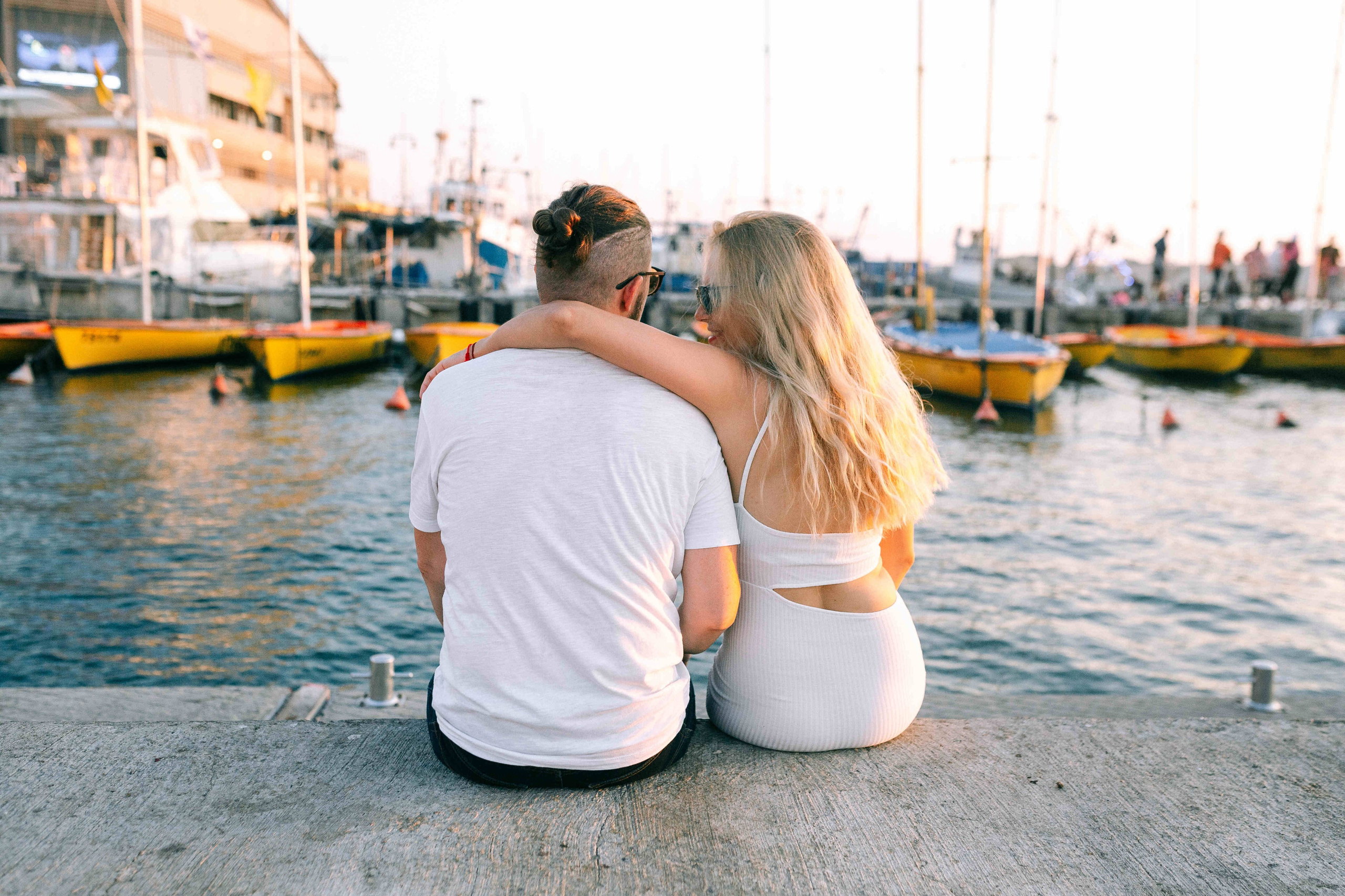 SUNSET IN JAFFO PORT. PHOTOGRAPHER IN ISRAEL