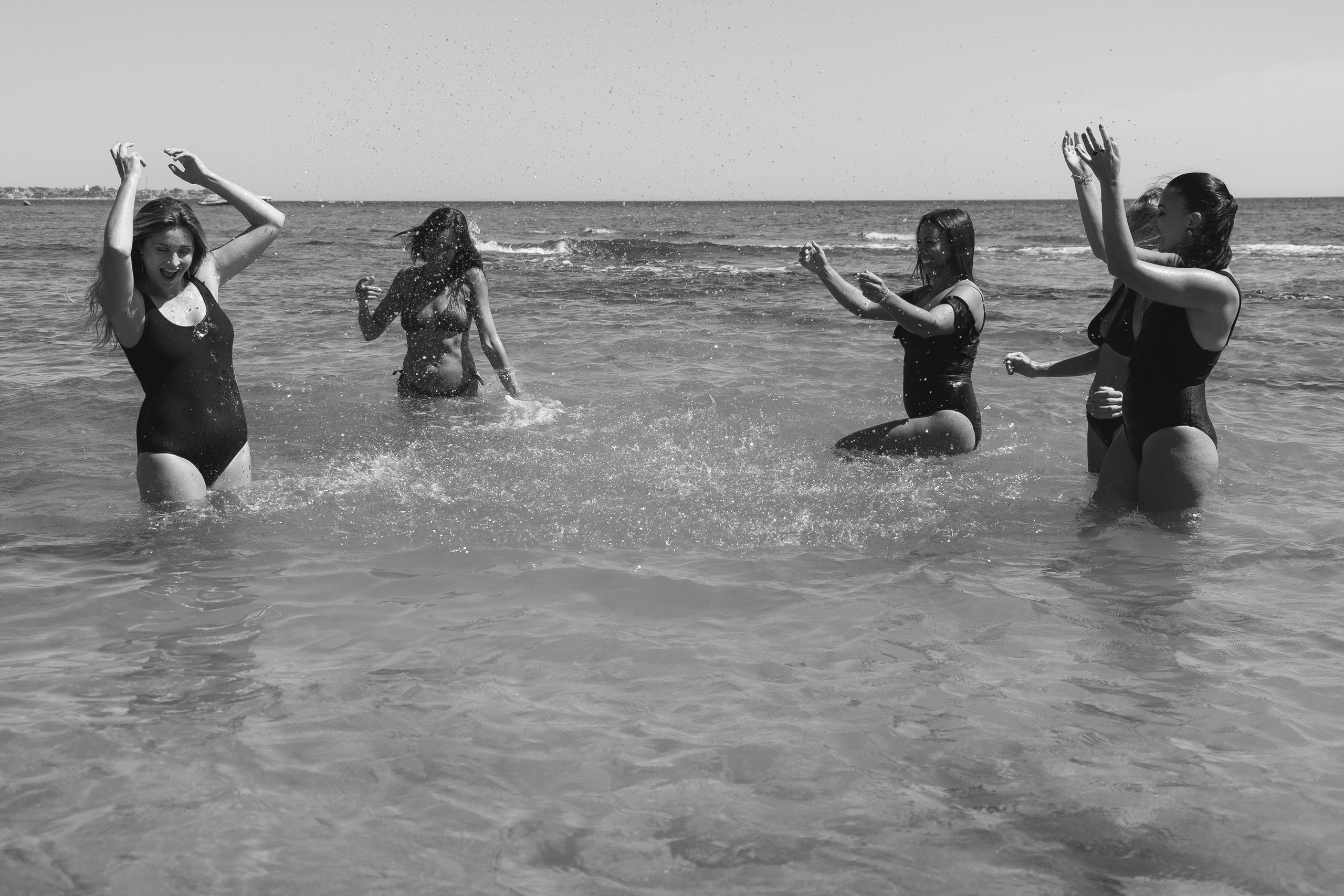 Five girls on the beach