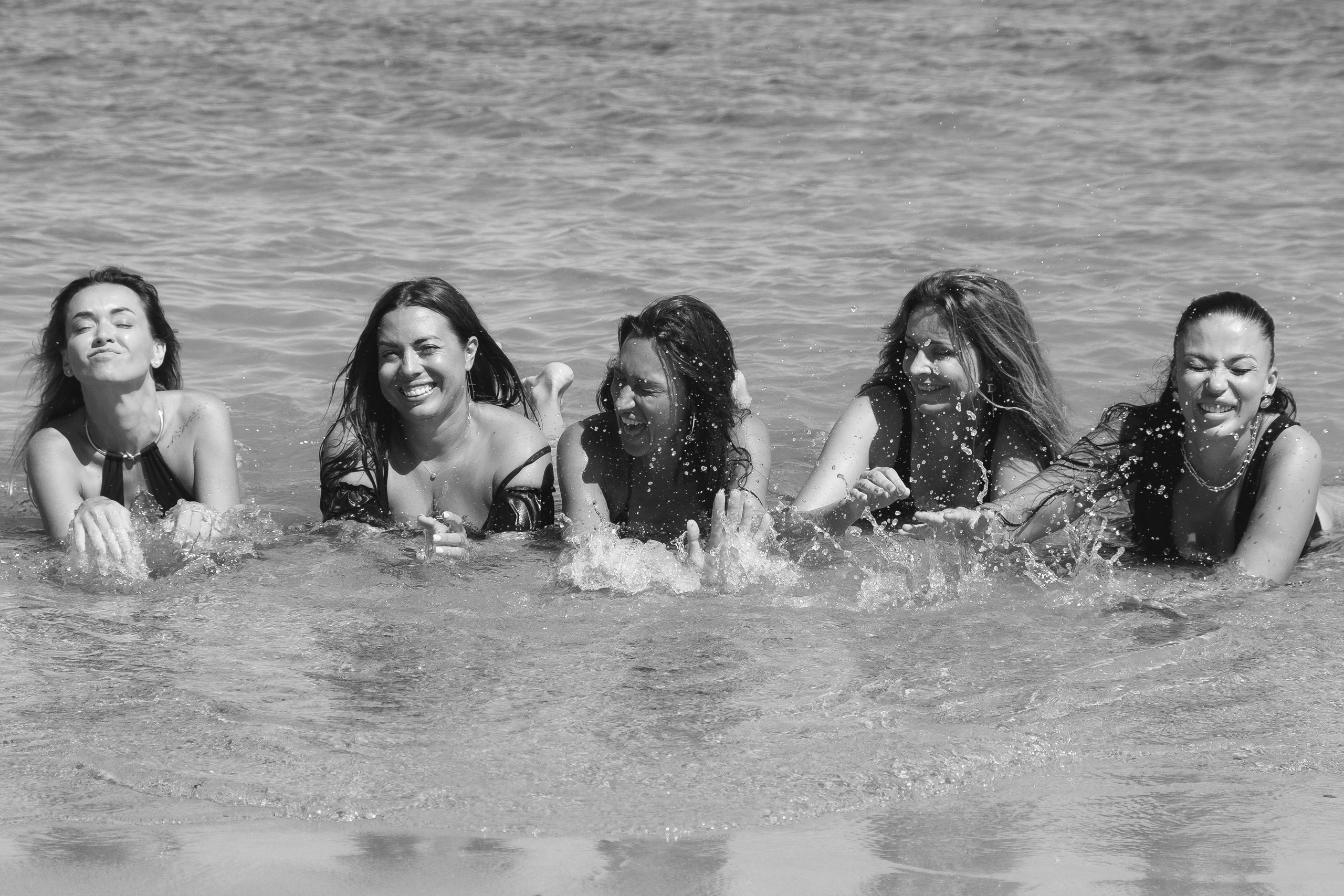 Five girls on the beach