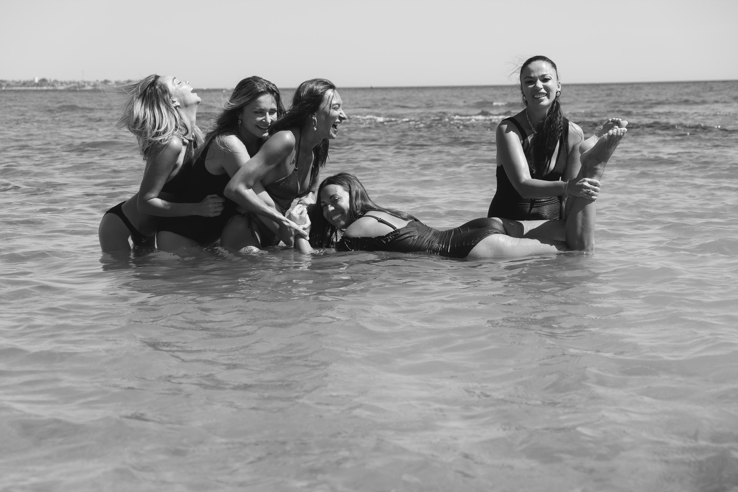 Five girls on the beach
