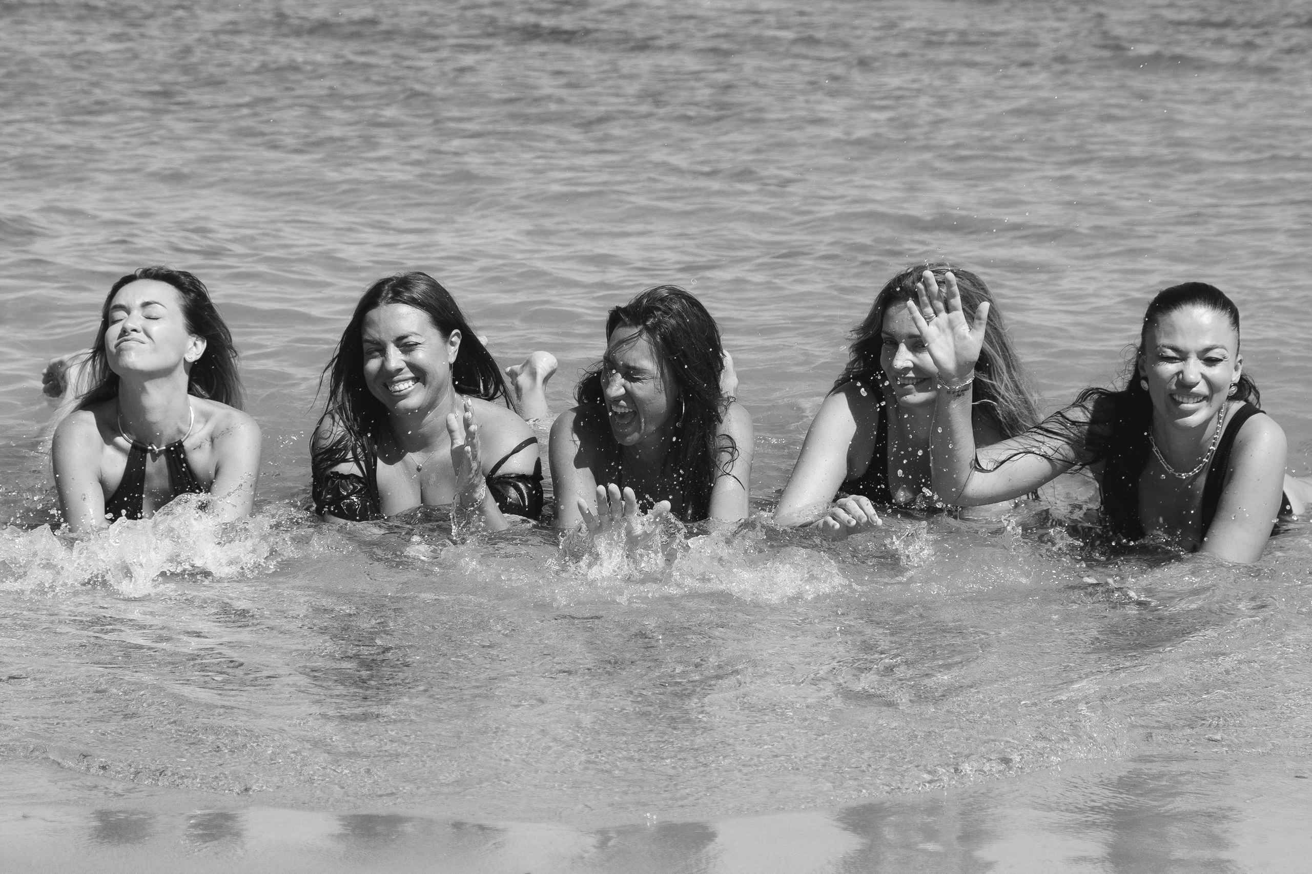 Five girls on the beach