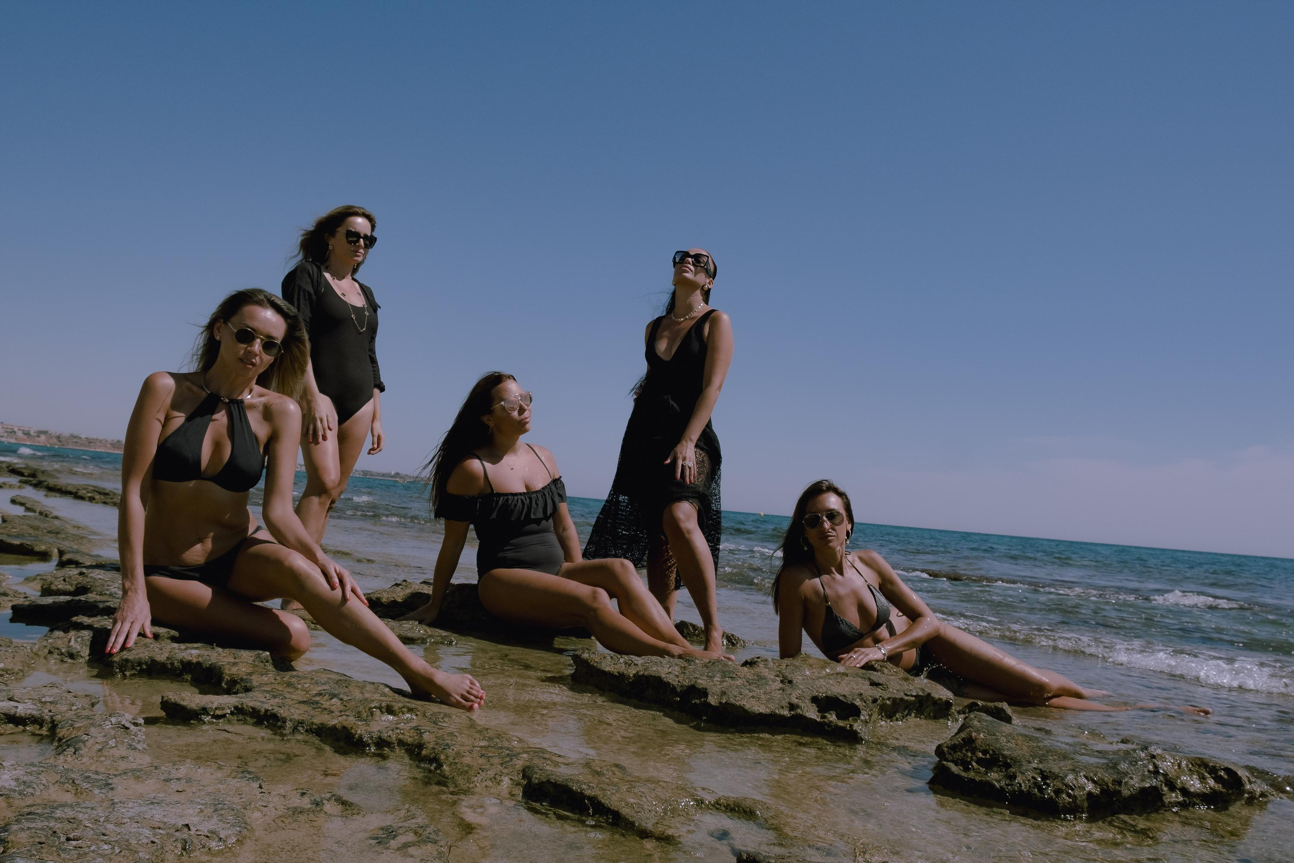 Five girls on the beach