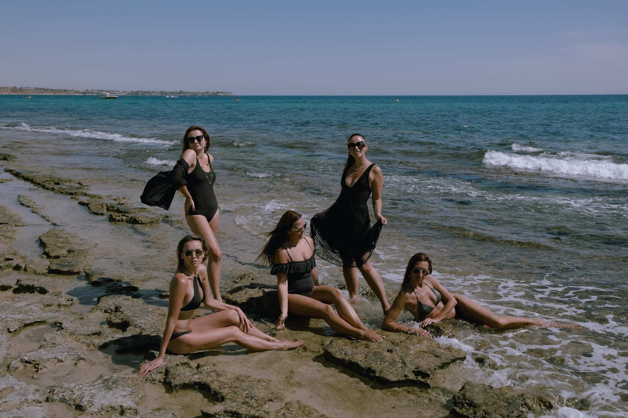 Five girls on the beach