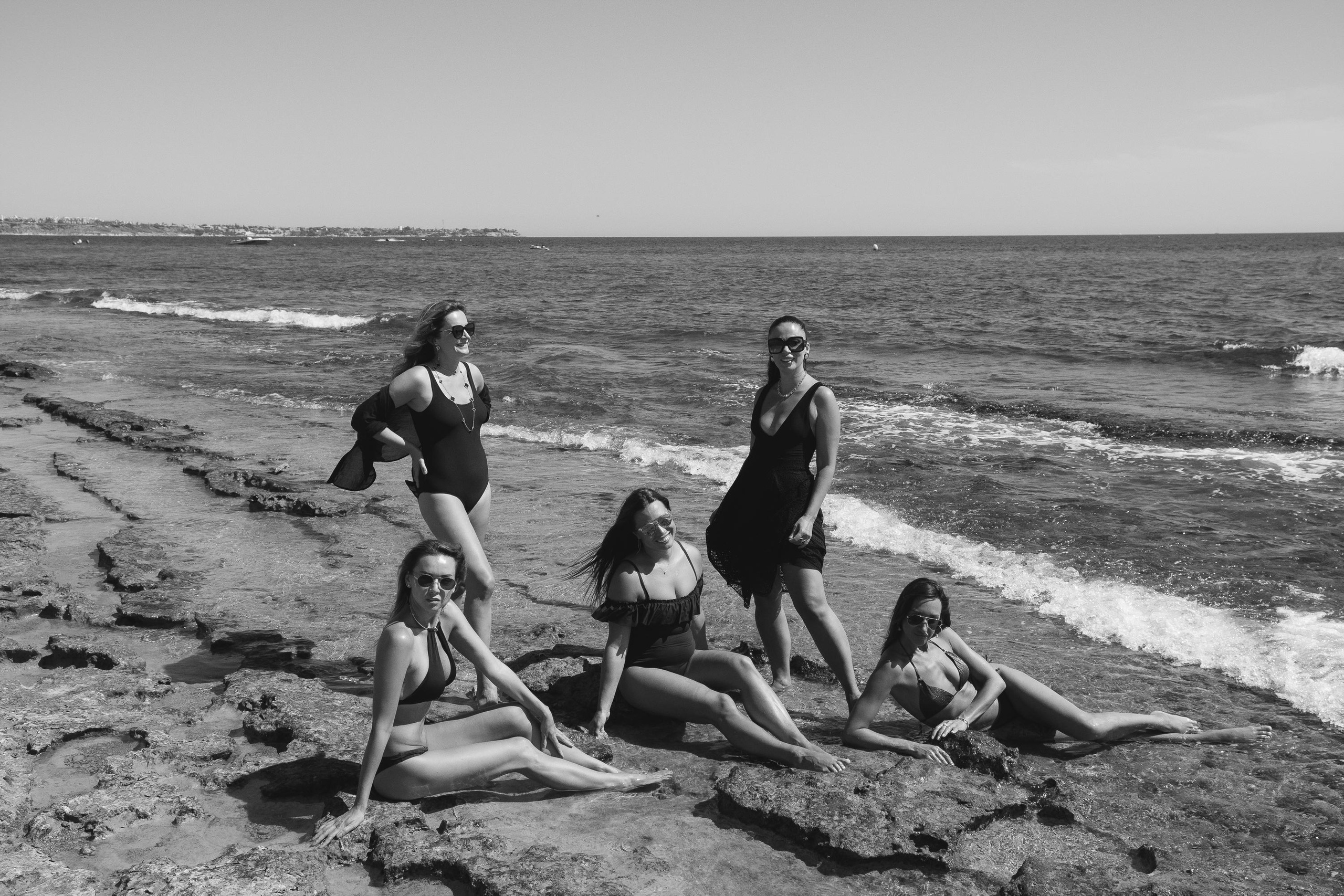 Five girls on the beach