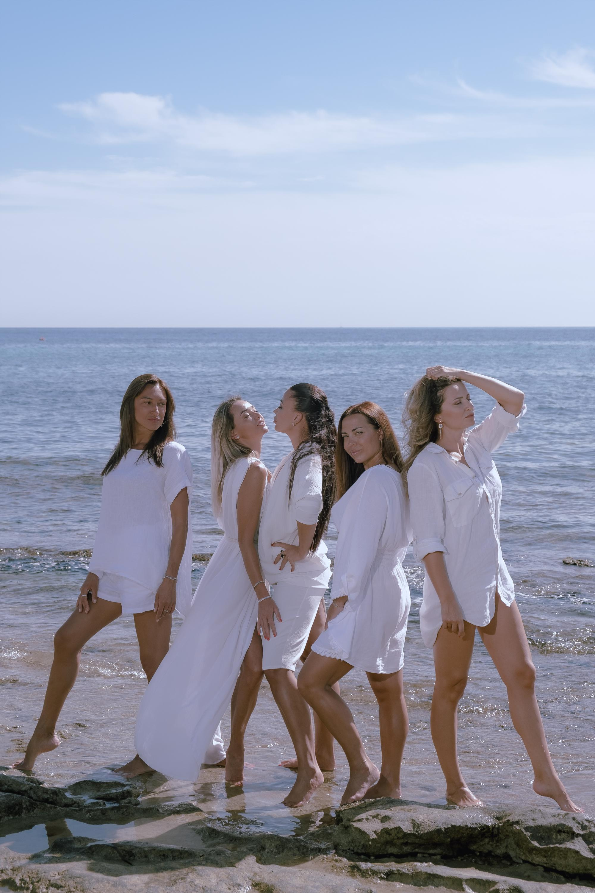 Five girls on the beach