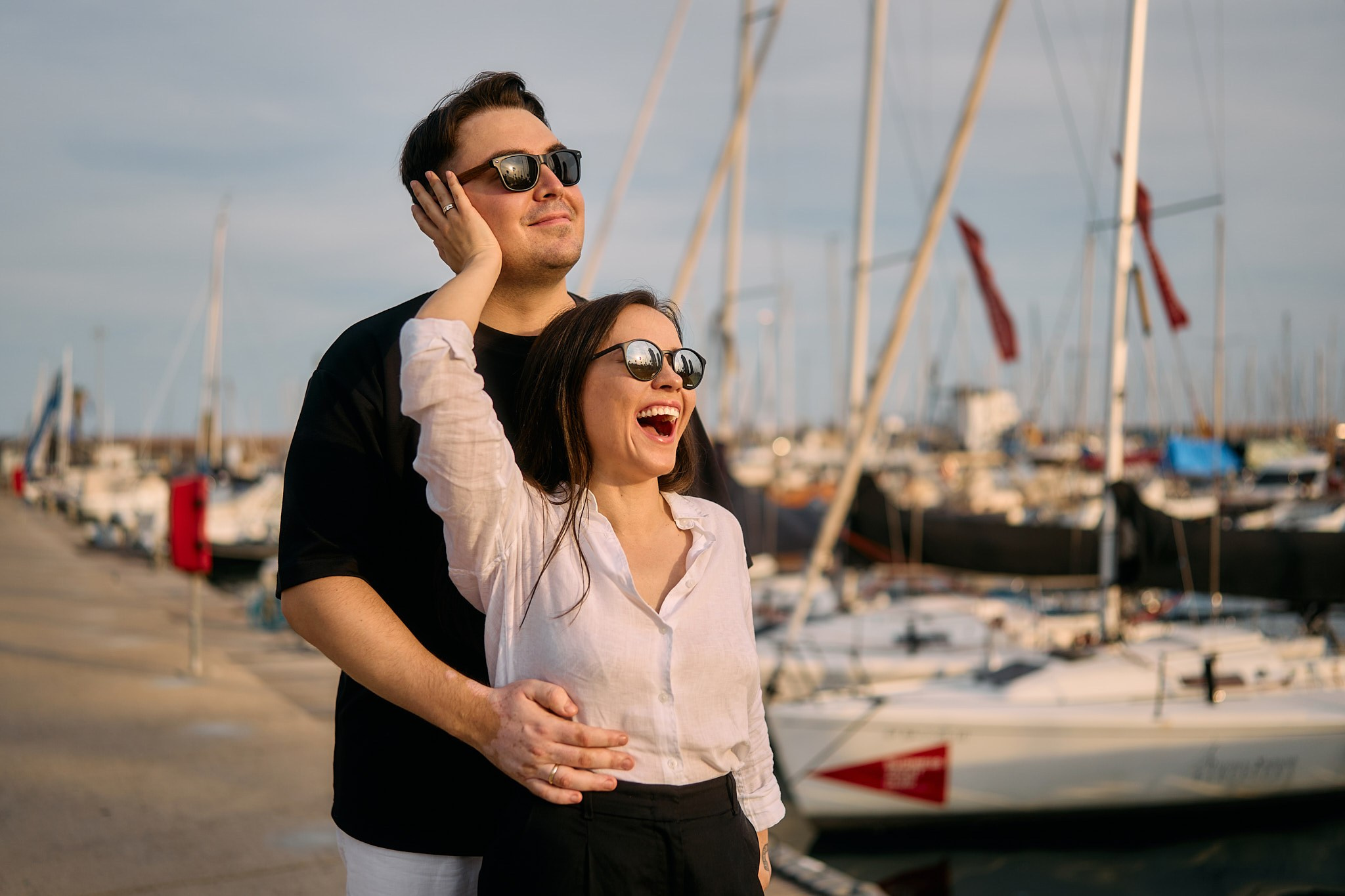 Description of the Port Olimpic location for a  love-story or individual photo shoot in Barcelona, examples of photos taken at this spot. POSTCARD.BCN Photographer Kate in Barcelona. Love-story, family or individual photo shoots