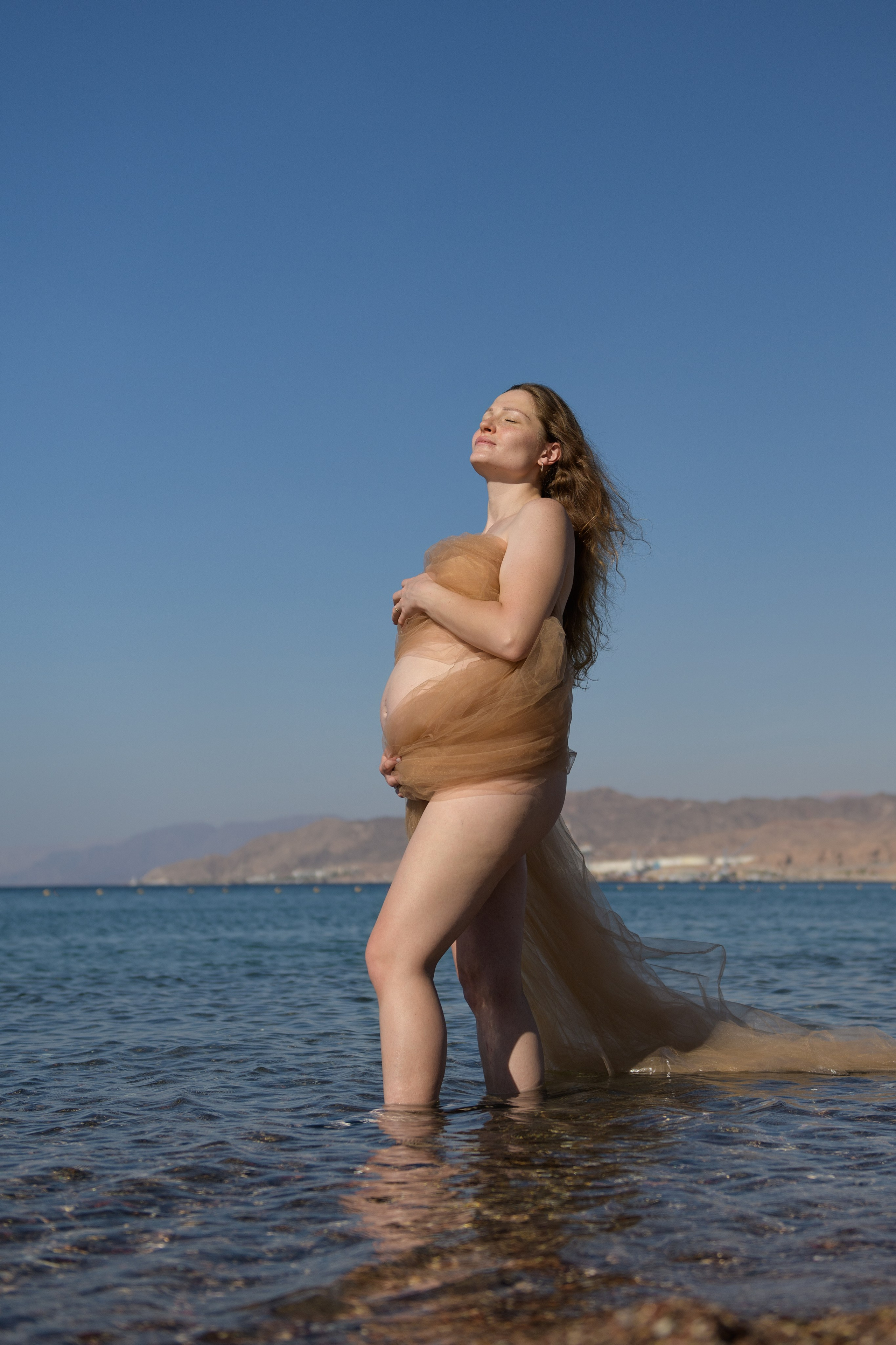 Julia & Dmitriy pregnancy photoshoot on the Red seacoast. צלמת משפחה ילדים הריון וסיפורי אהבה באילת ישראל אולגה אמצ'יסלבסקי