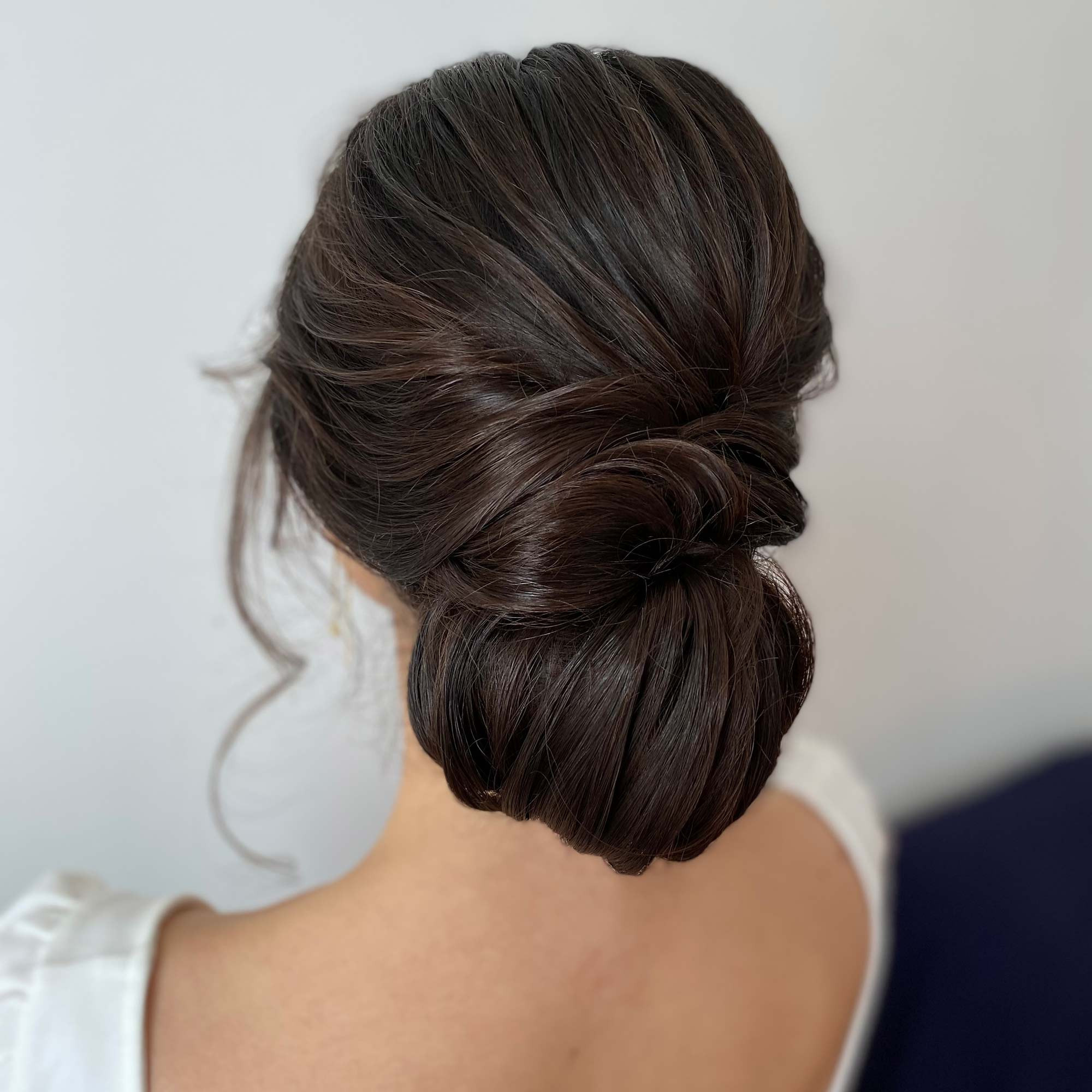 Chignon Updo Hairstyle for Long Hair a sophisticated twisted low bun