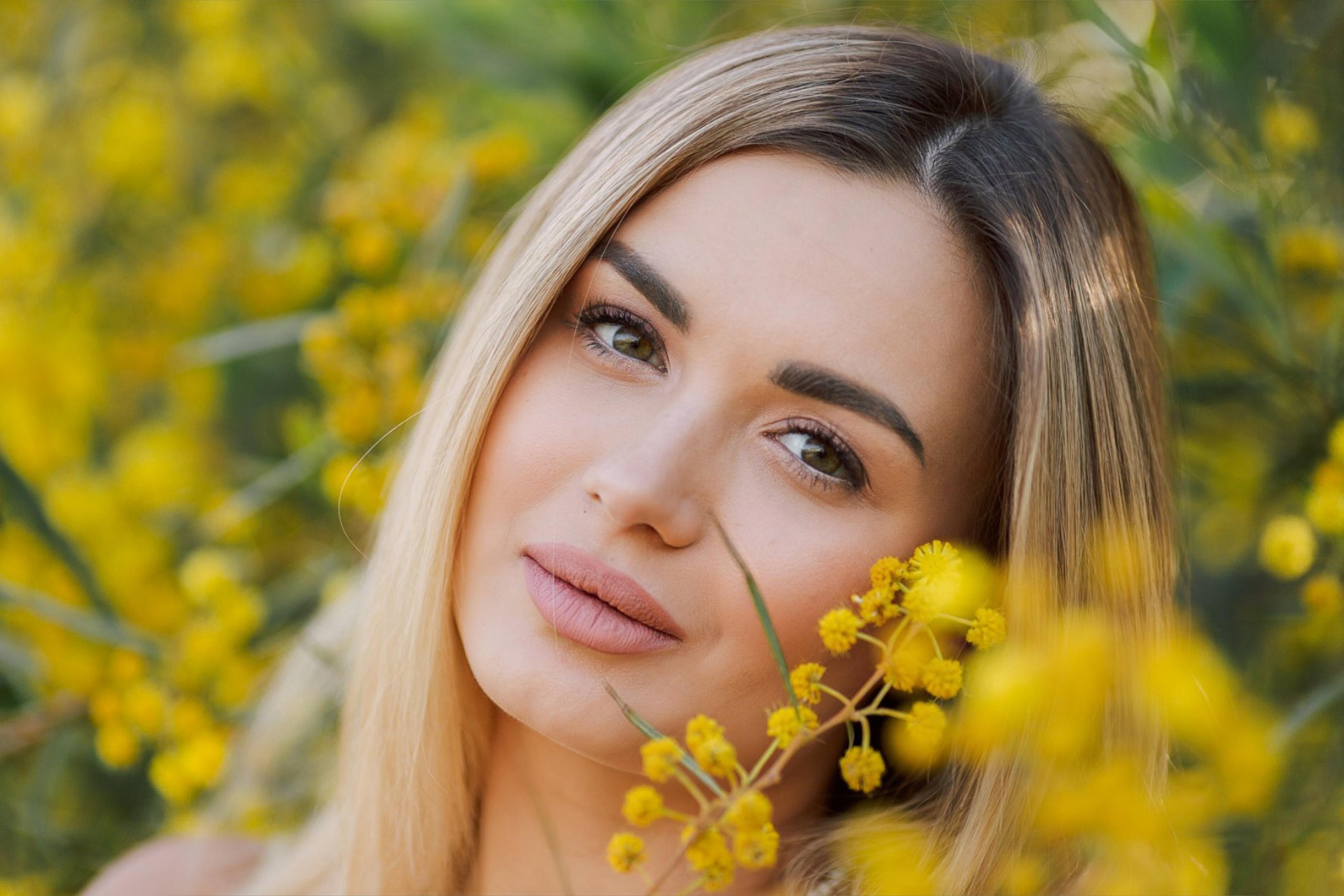 Photo shoot of the unique beauty of yellow mimosa trees. Professional Photographer in Alanya, Side, Belek, Antalya. Turkiye