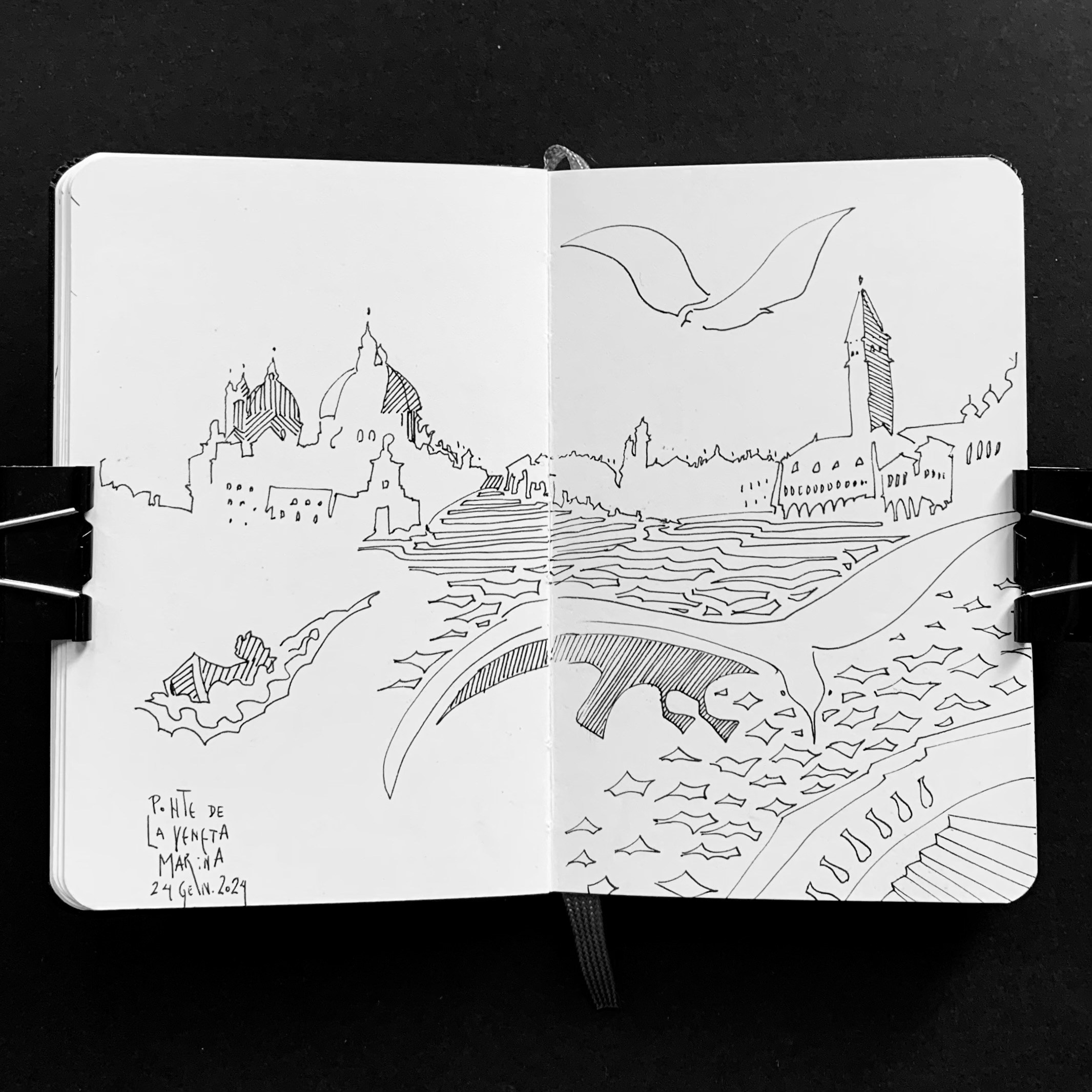Moleskine notebook with original drawings made in Venice, works on paper by Nadia Kuprina, contemporary artist living and working in Venice. A live black and white drawing with seagulls over a Venetian bridge.
