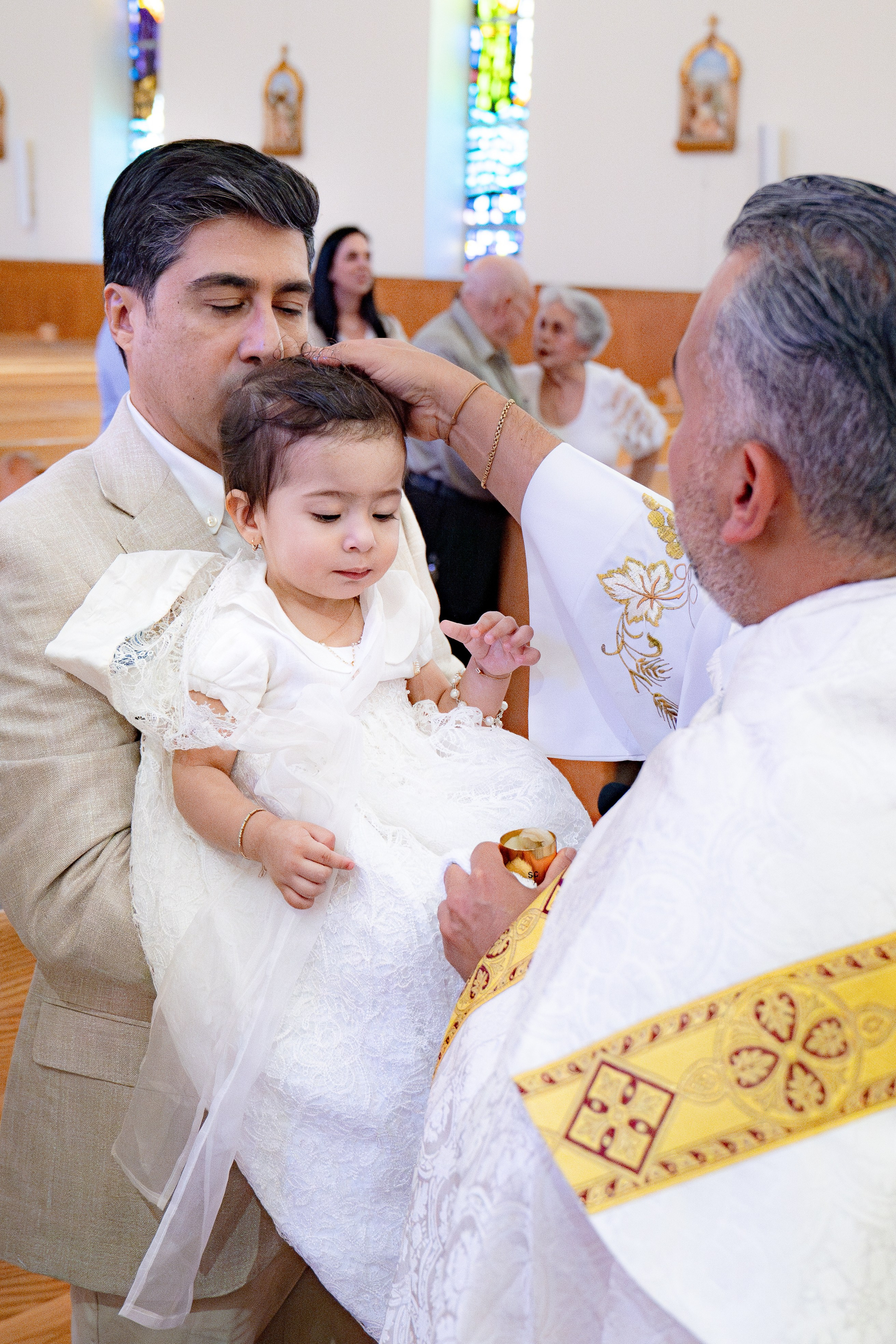Baptism of Eva Isabella. Https://the-photo-way.wfolio.pro
