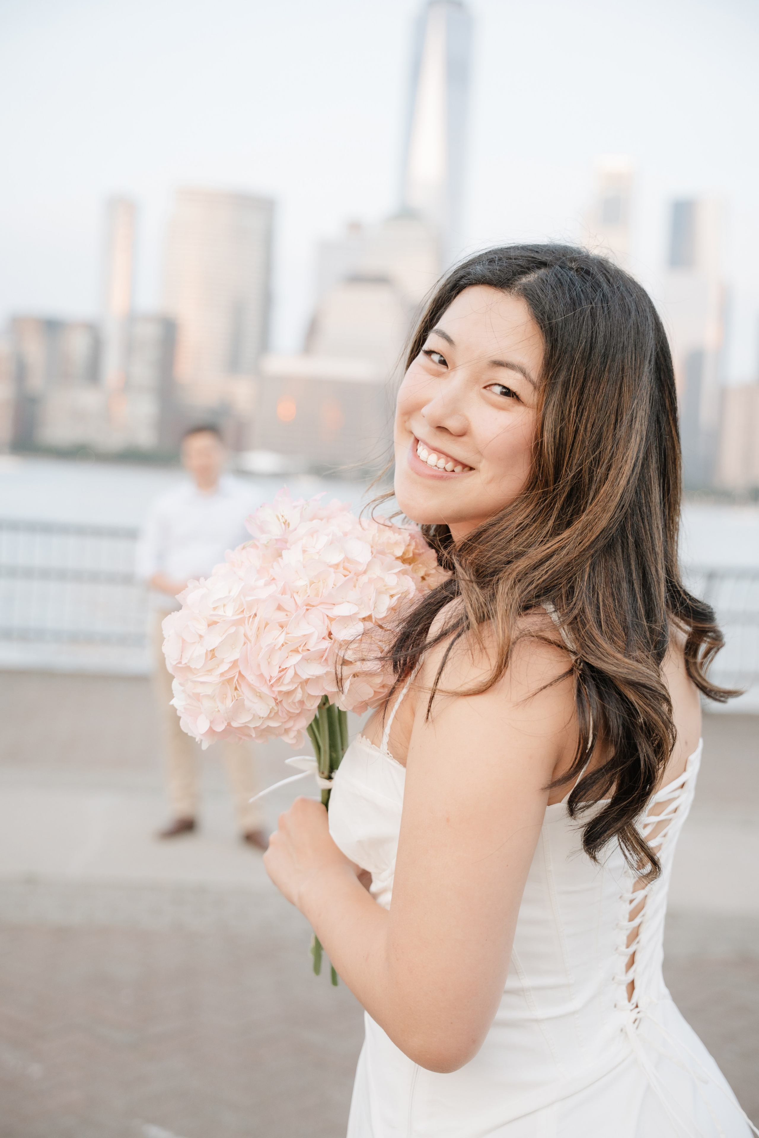 An adorable couple with their dog. Portrait and wedding photographer in New York