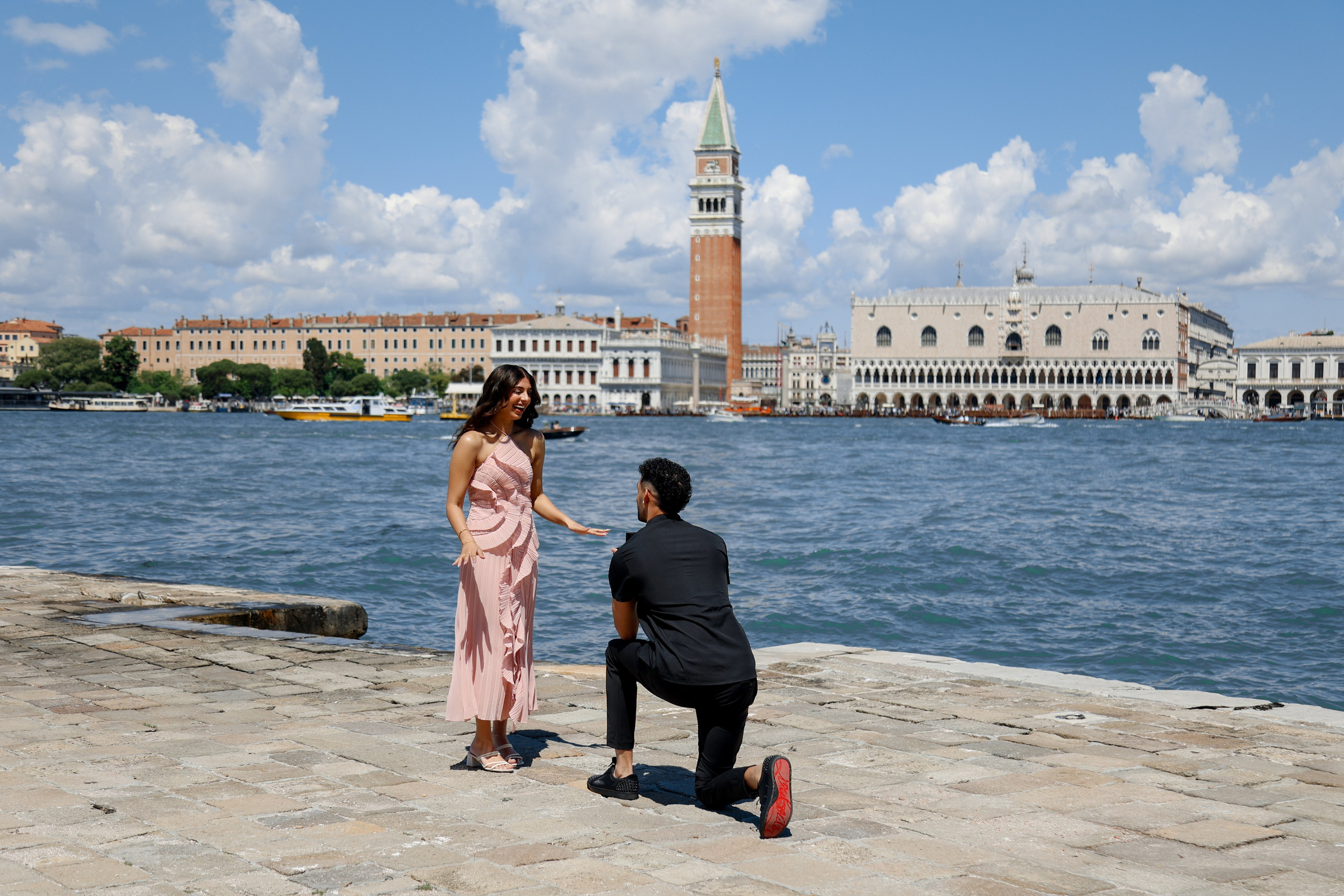 Surprise marriage proposal in Venice near the canal