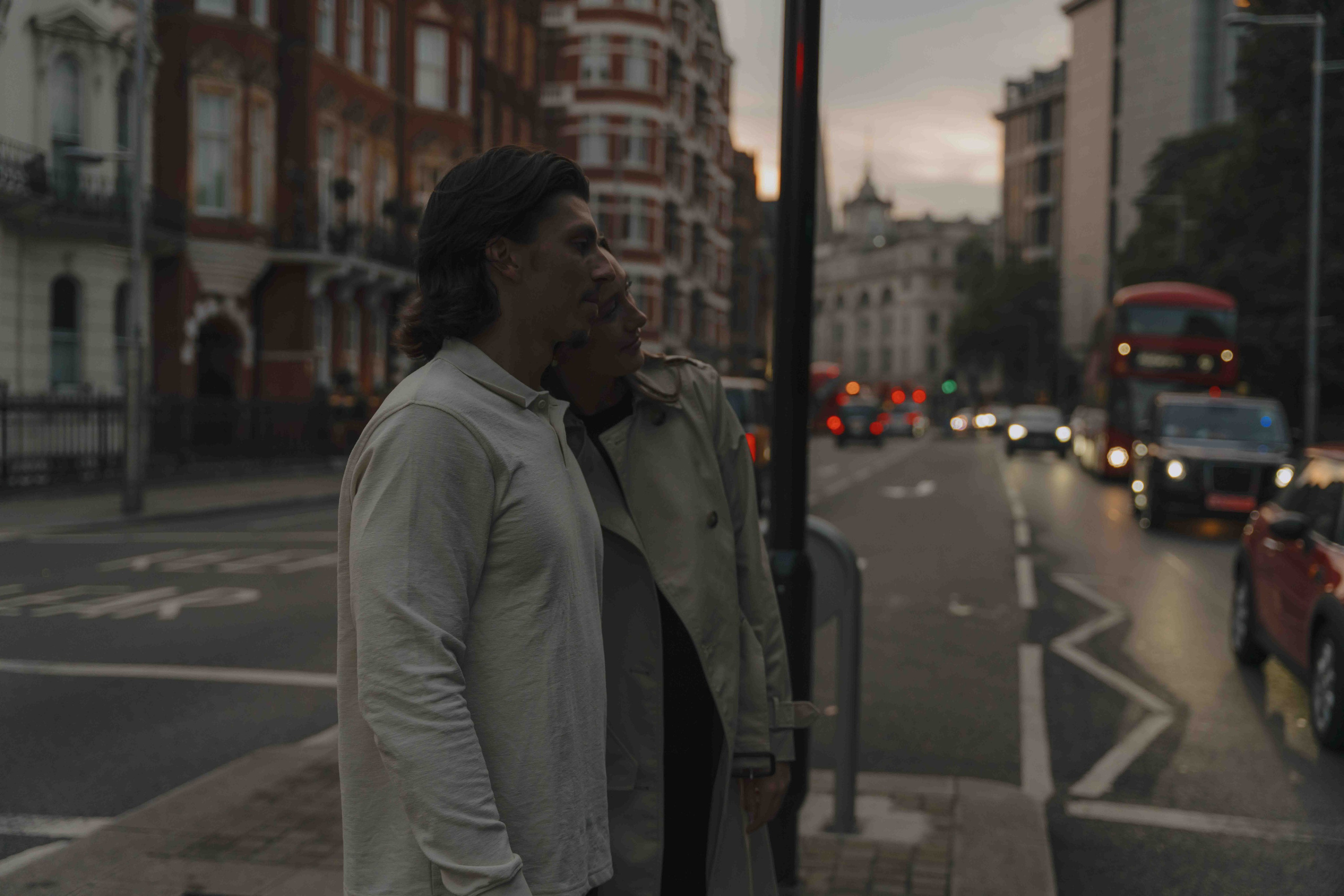 Couple entering Kensington Gardens London before proposal sunset
