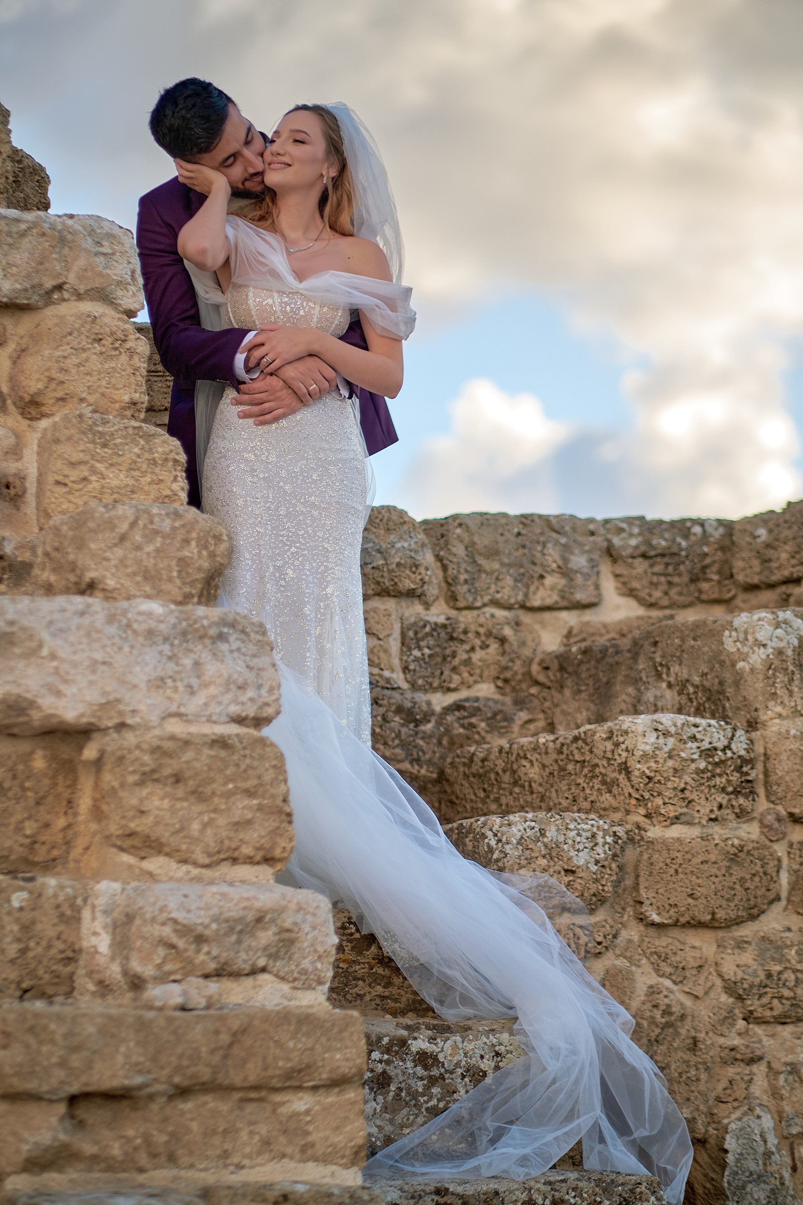 Love Story , wedding Romantic wedding couple portrait, bride with veil and groom in suit, emotional wedding photography by Maxim Polak Israel
