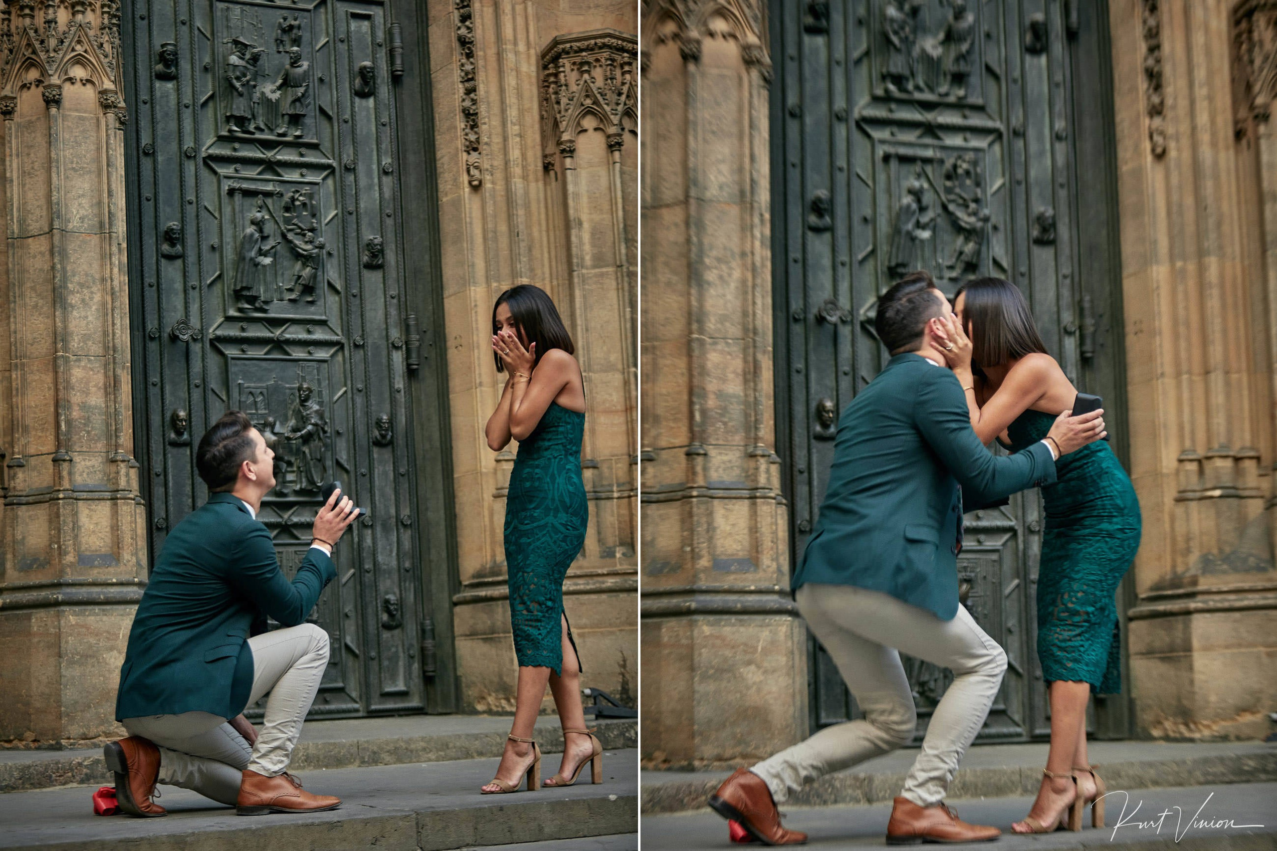 Man on one knee proposing near the bronze doors of St. Vitus Cathedral as woman in green dress shows shocked expression.