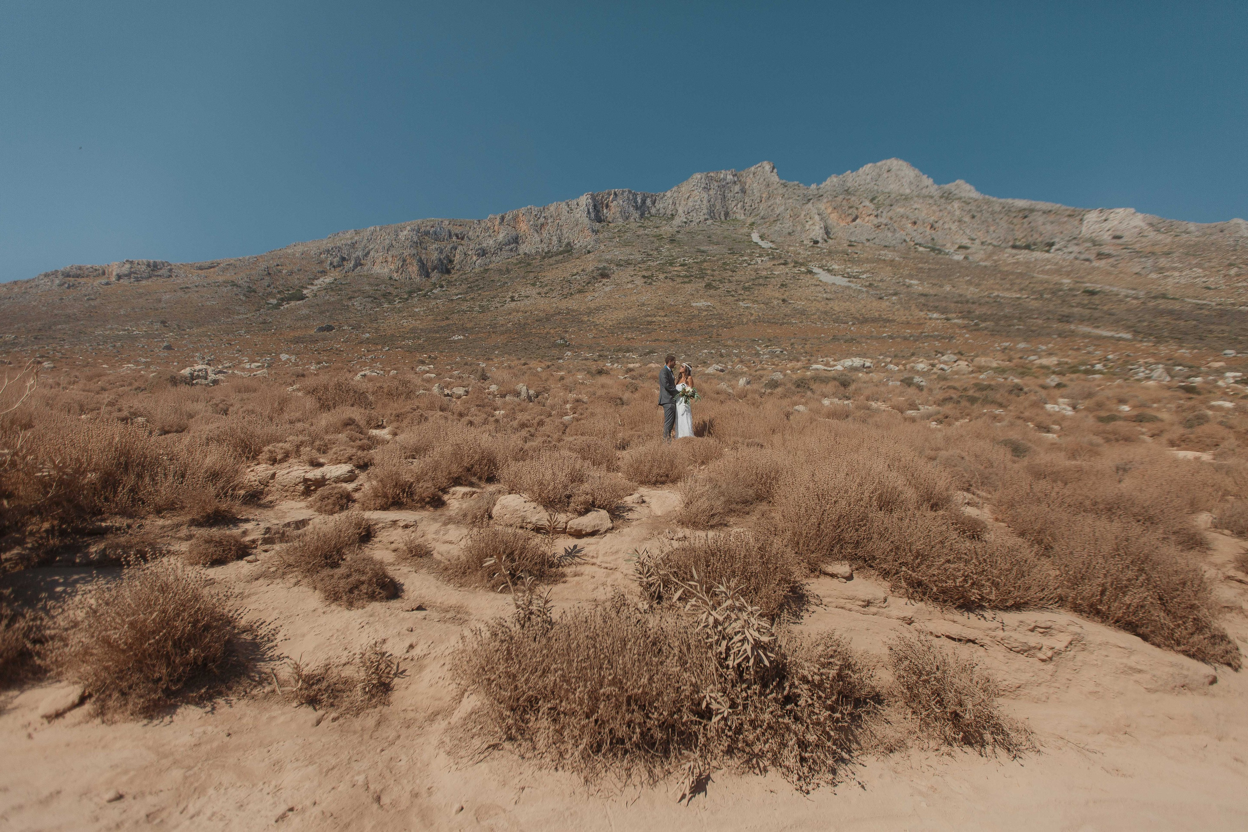 Marino & Steffi, Crete. Denny Savon — Photographer in Santorini | Weddings, Love Stories & Flying Dress