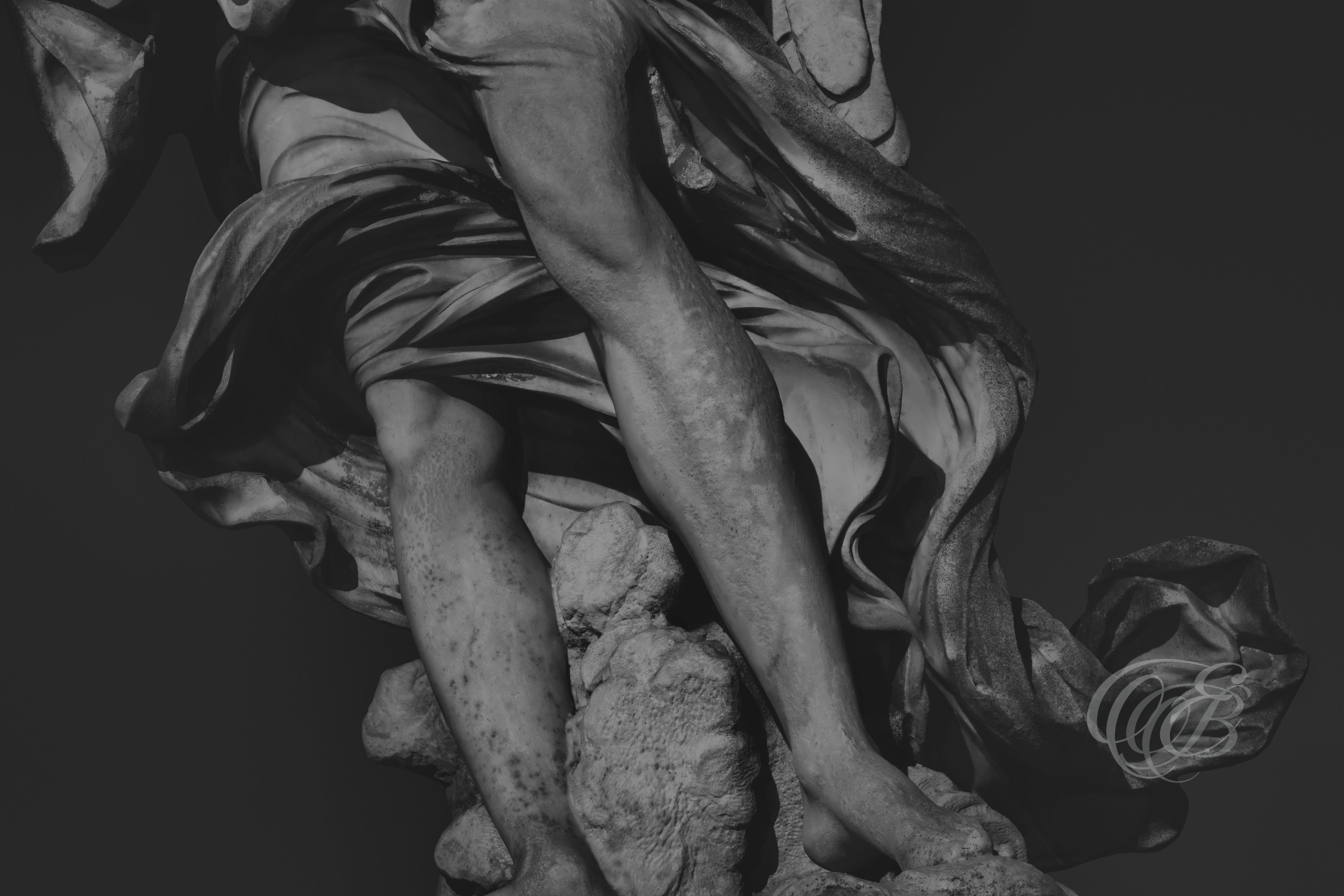 Rome Italy - Angel's Feet at Ponte Sant'Angelo - Eduardo Bartoli Fine Art Photography - Black and white fine art photograph of the feet of the angel statue at Ponte Sant'Angelo in Rome, Italy – photography by Eduardo Bartoli.