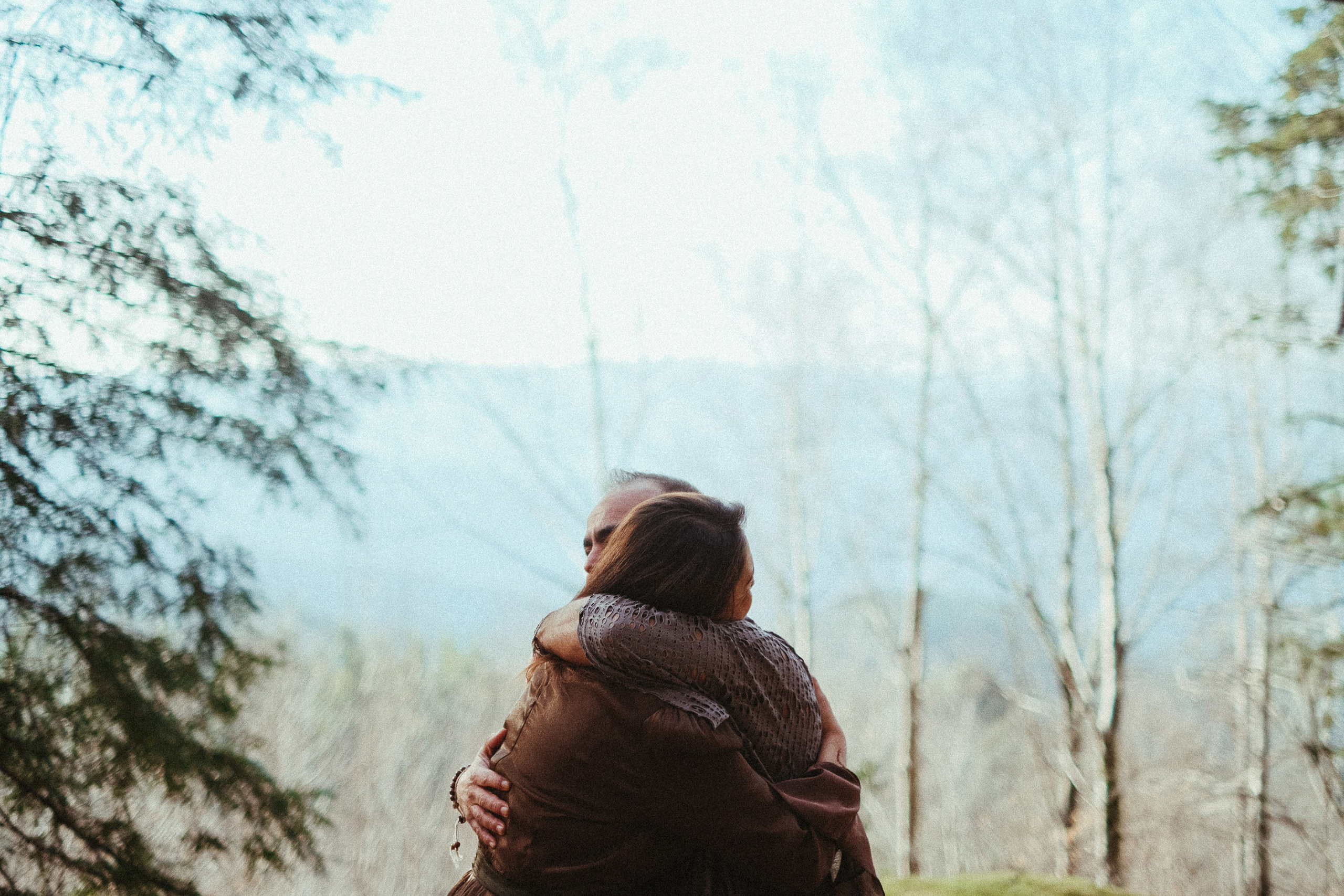 intimate couple embracing in nature during Portugal pre wedding shoot