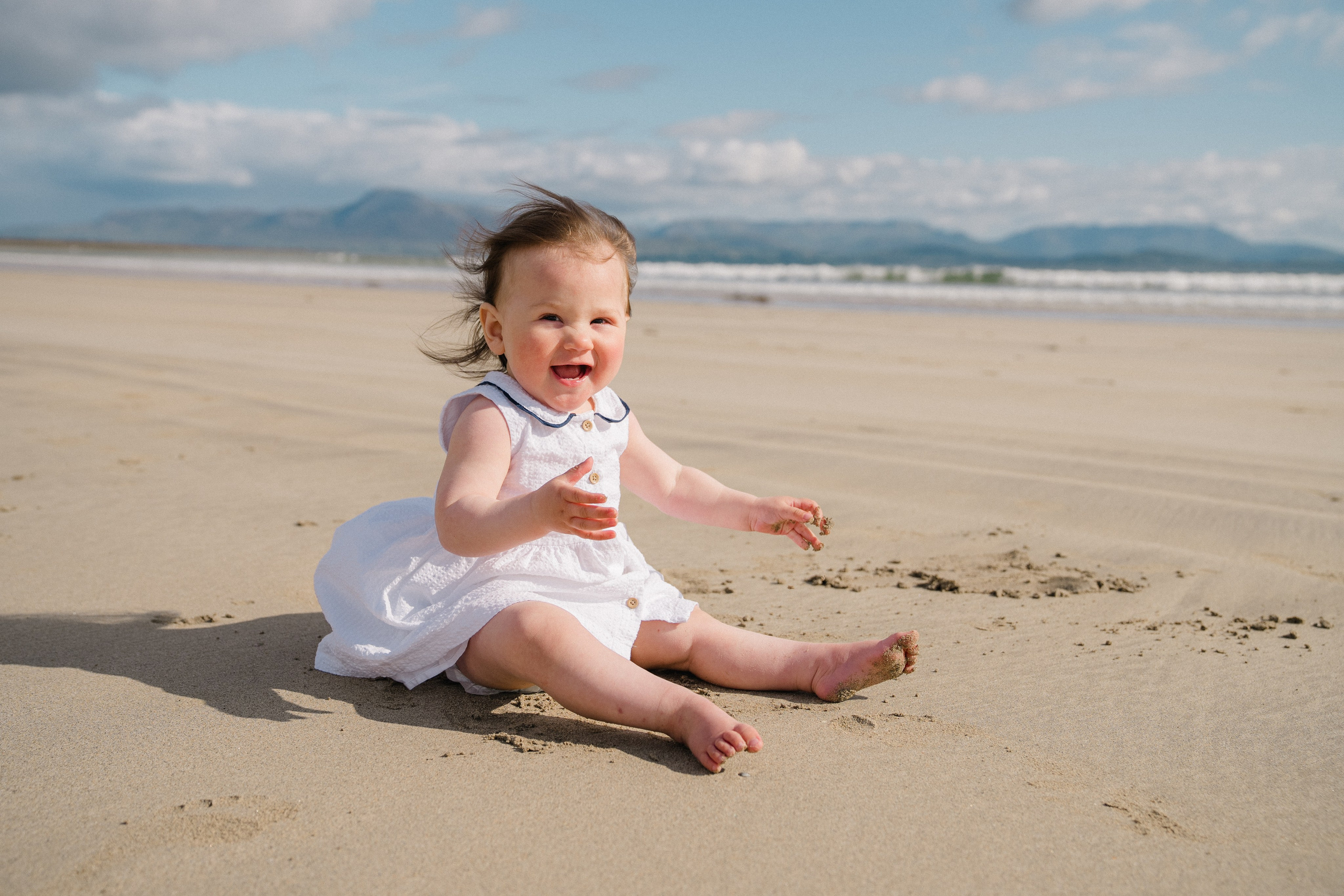 Darya and Mia at the ocean. Wedding and family photographer Ireland