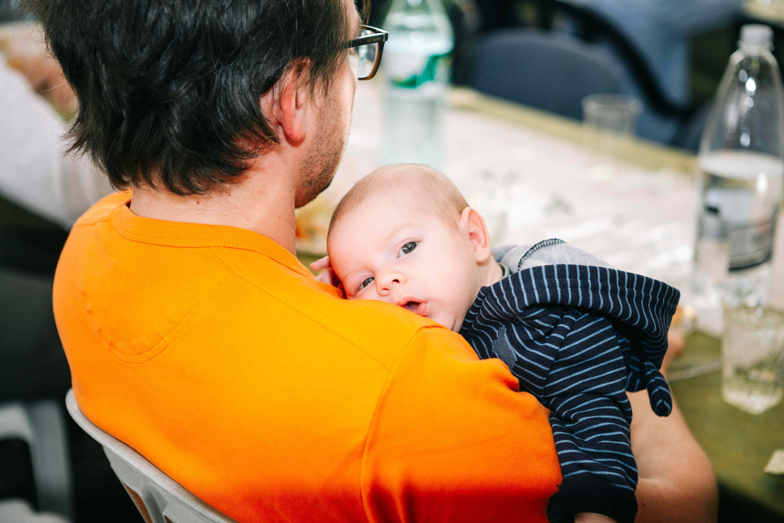 BRITH MILA IN THE SMALL SYNAGOGUE. PHOTOGRAPHER IN ISRAEL