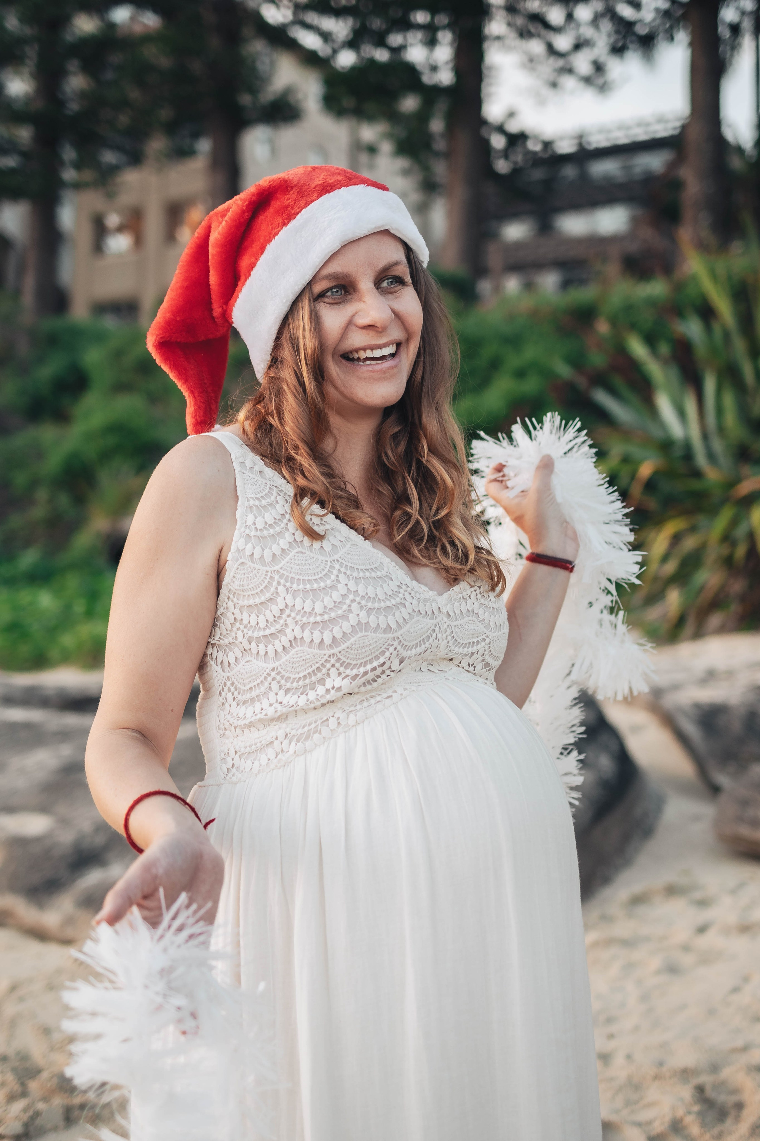 Heather + Tulio + Pregnant + Christmas. True Story Photography