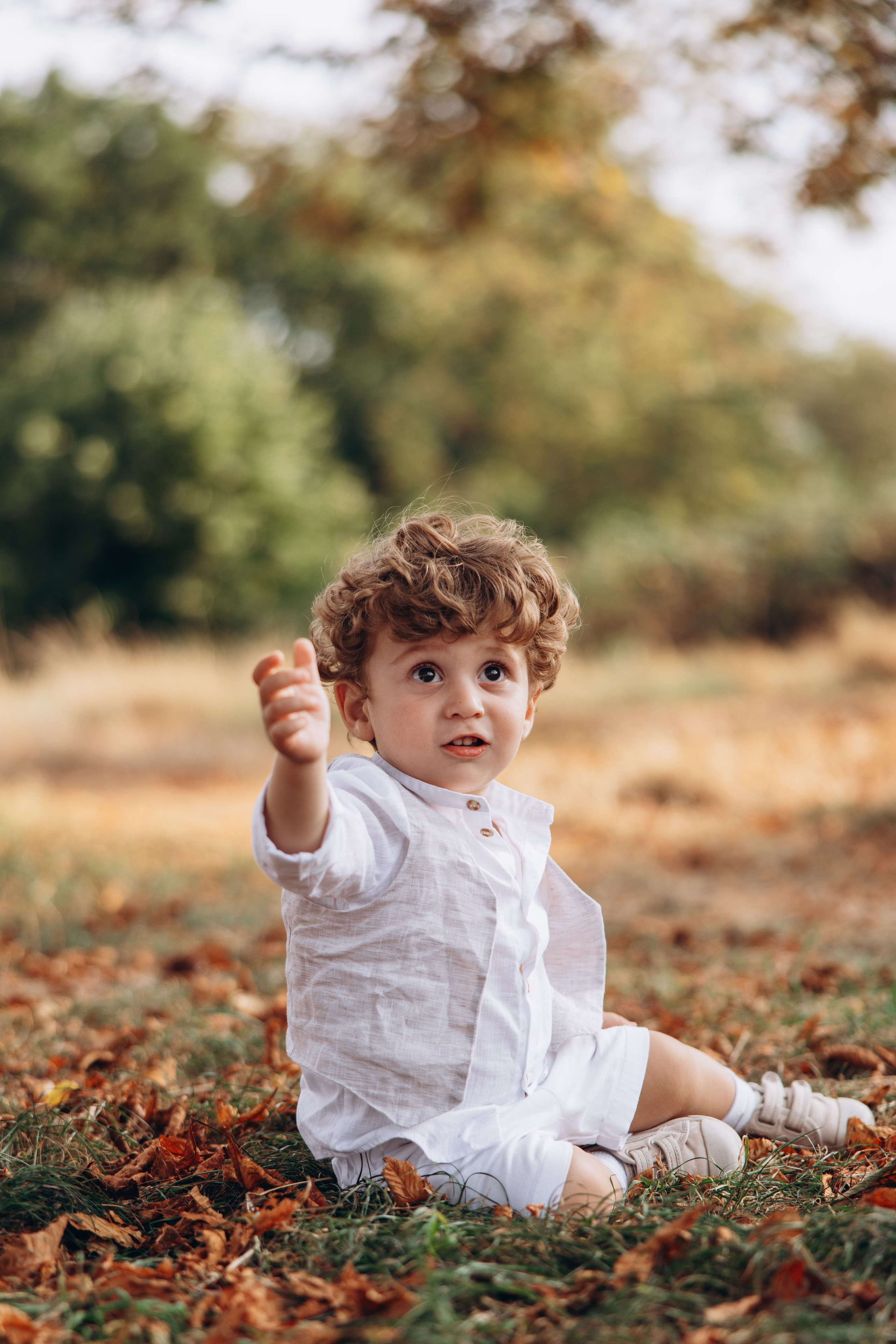 Valerik with parents (Hyde park). Anastasia Klink, Photographer in London
