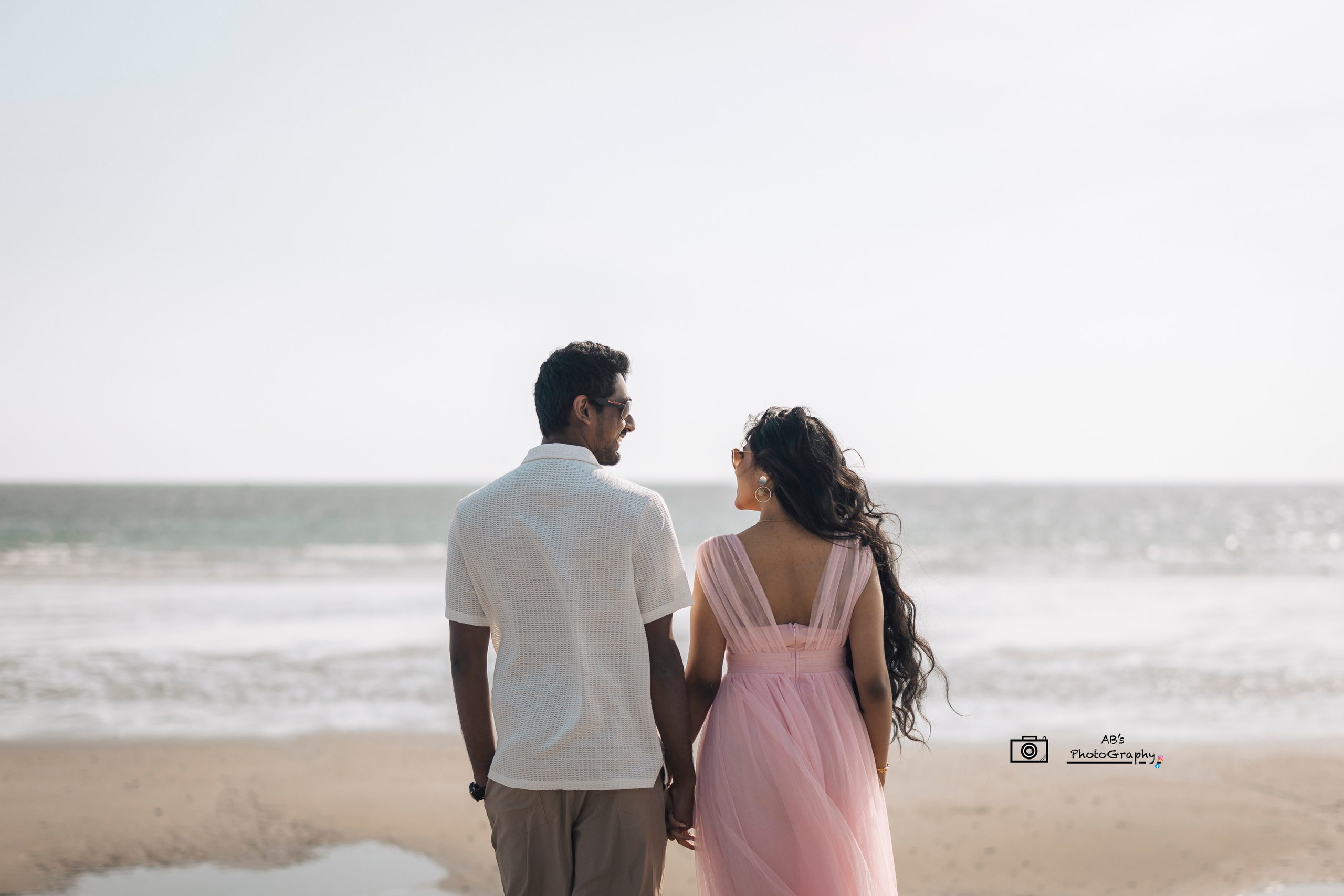 Luxury pre-wedding photoshoot for a South Asian couple in New England with high-fashion styling, editorial photography, and cinematic wedding videography.