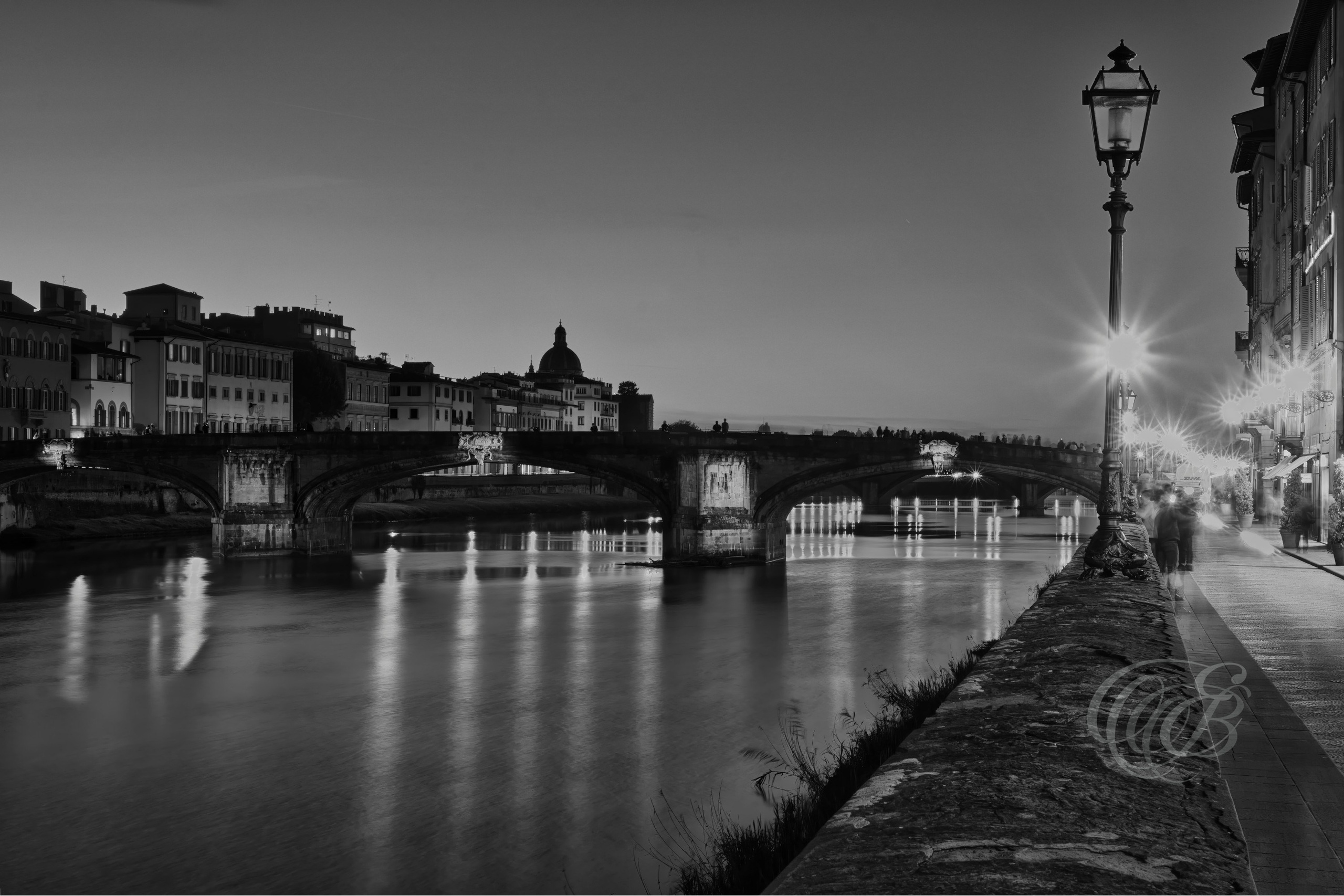 ITALY – FLORENCE — Ponte Santa Trinita Black and White — Renaissance bridge designed by Bartolomeo Ammannati spanning the Arno River, featuring elegant elliptical arches and historic Florentine architecture, Florence, Italy — Eduardo Bartoli Photography.
