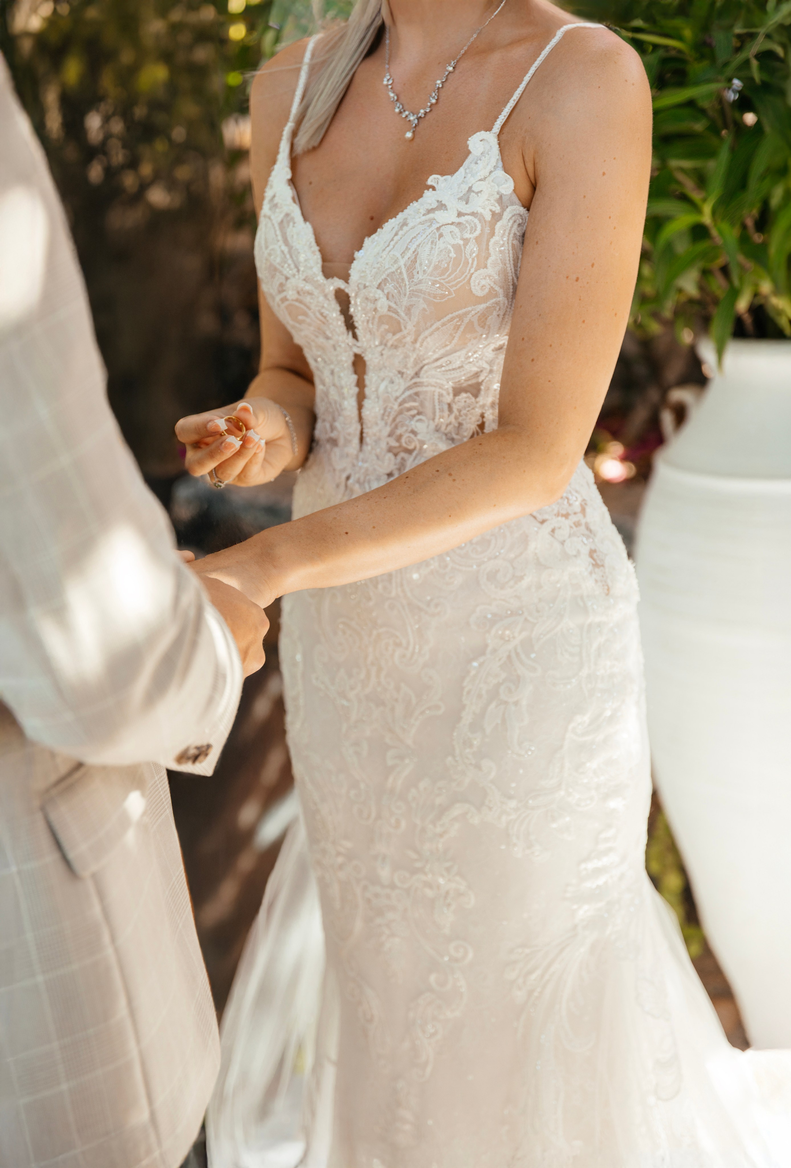 Romantic wedding ceremony in Lindos, Greece, with the couple holding hands, Wedding photographer, Rhodes