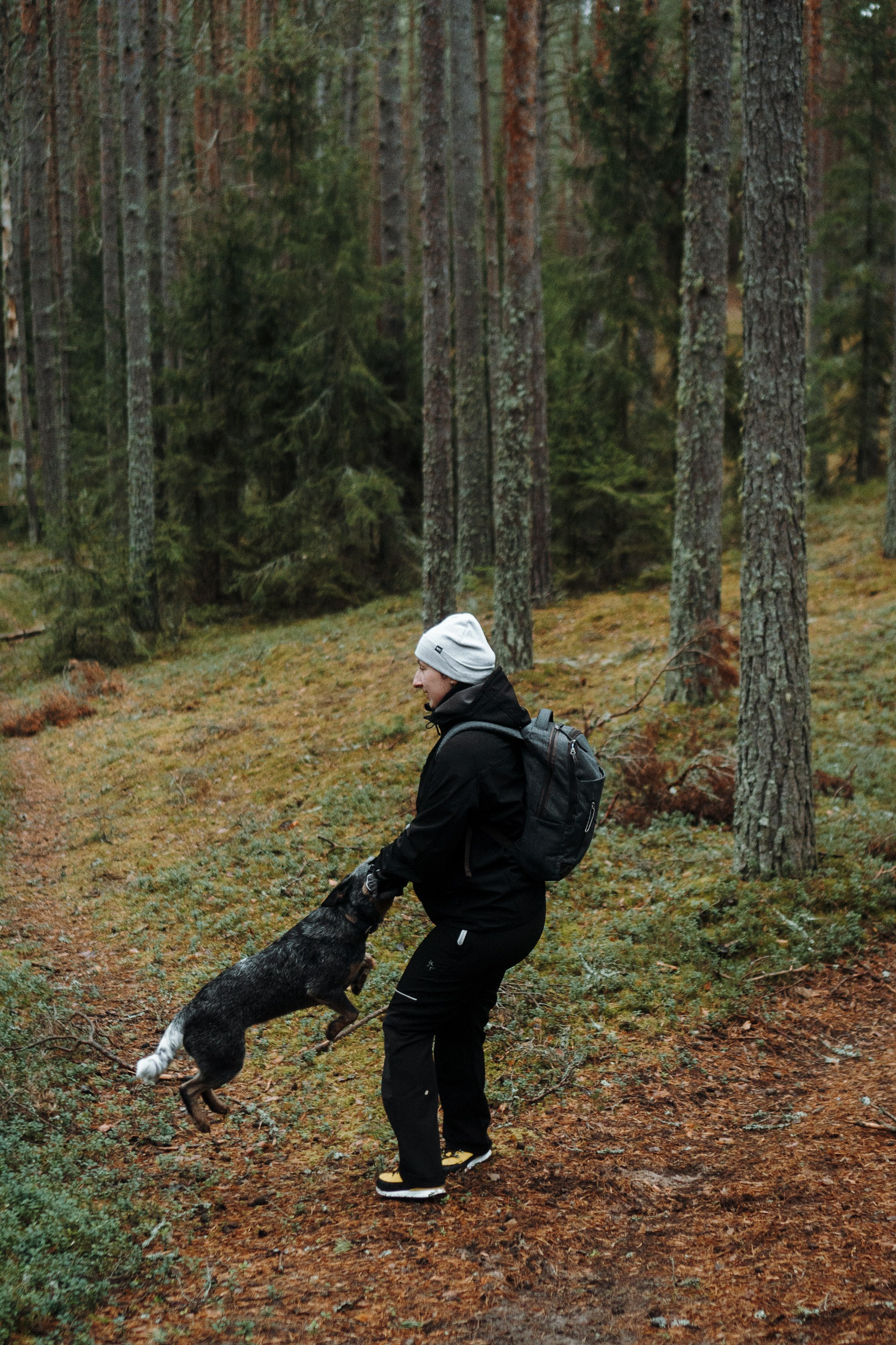 Polina and her Dakota, Australian Cattle Dog. Kat Laisaar — Pet photographer in Tallinn