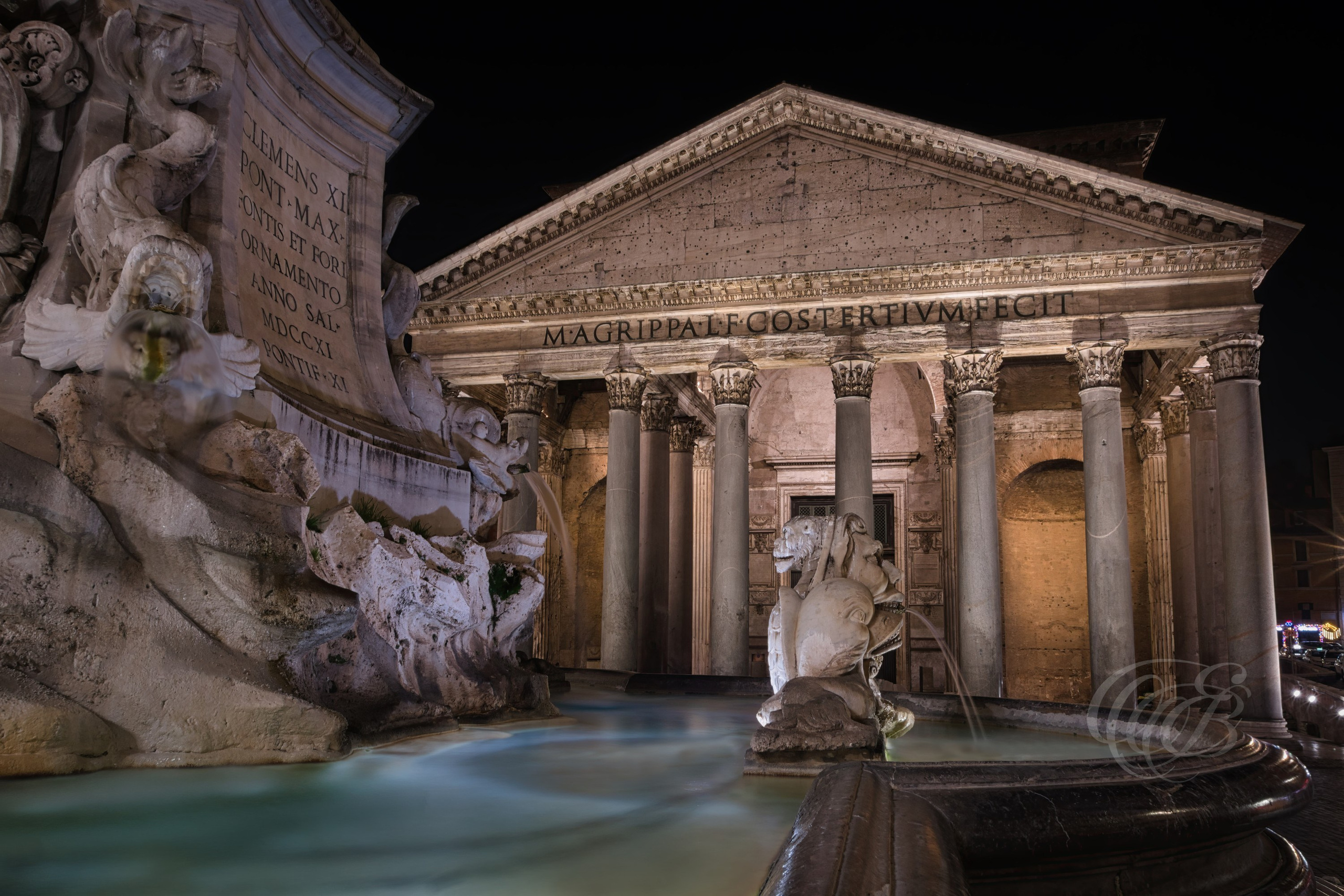 The Pantheon in Rome, Italy, stands illuminated against the night sky in this striking fine art photograph. Capturing the perfect balance of light and shadow, the image showcases the monument’s timeless architecture with exceptional detail. A refined addition for collectors and admirers of Roman heritage. Eduardo Bartoli Photography.