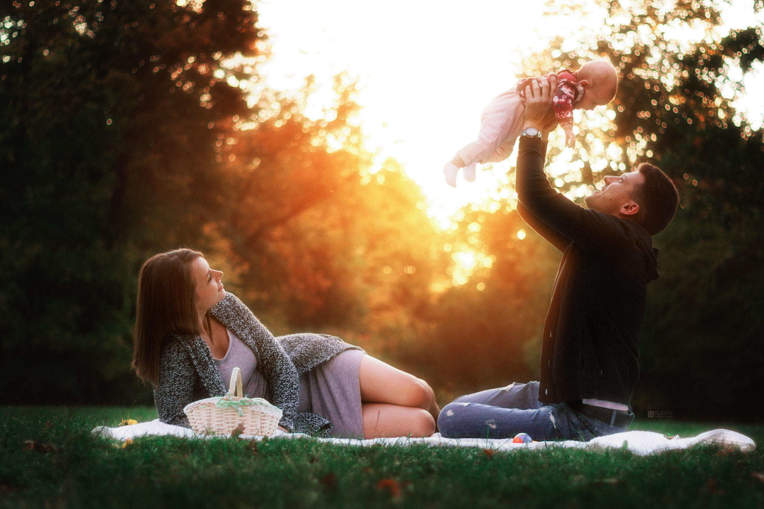 Smiling family of three in nature outdoor photo session, Dimitri Ilkov photography, Edmonton