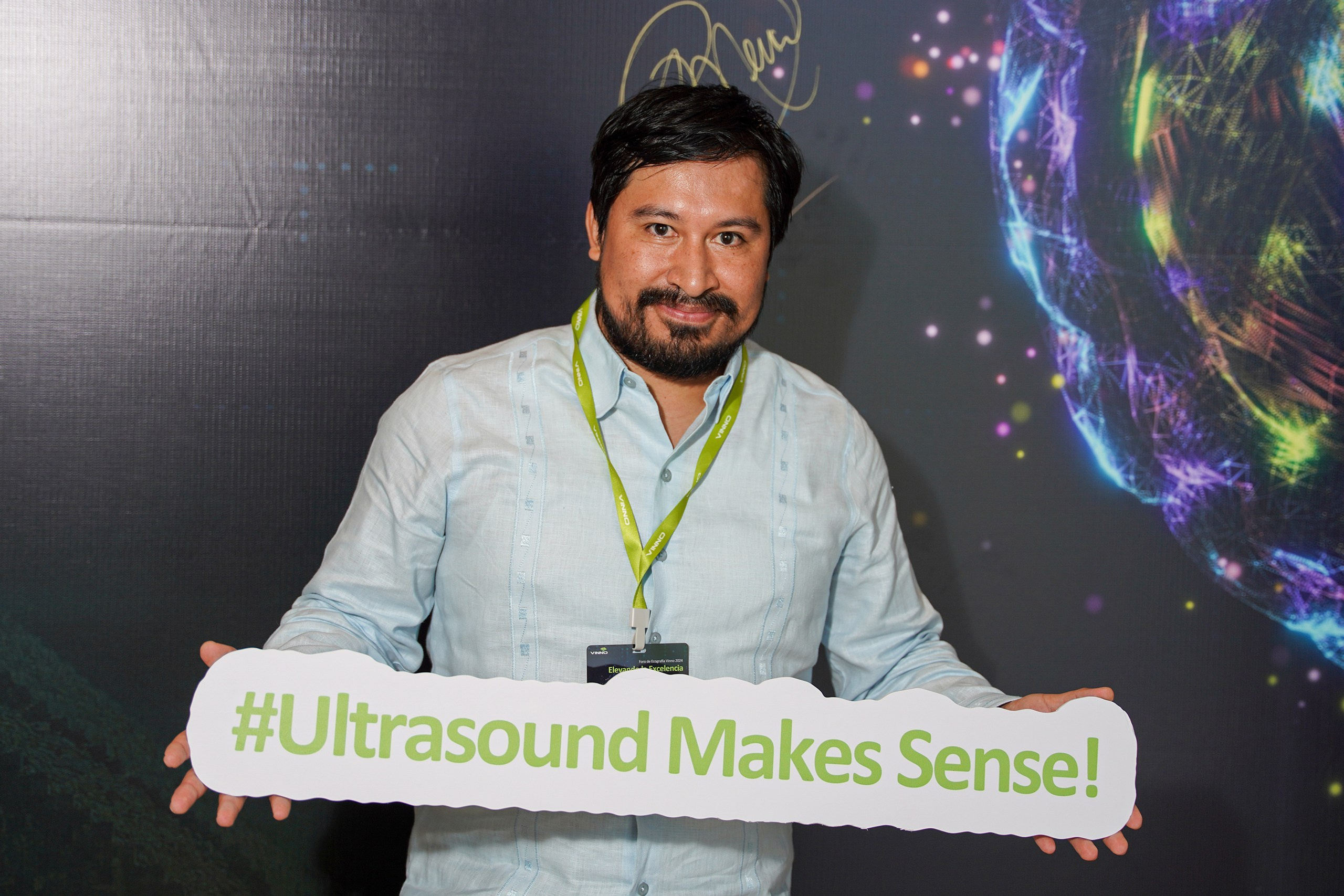 Portrait of attendee listening attentively during keynote session.