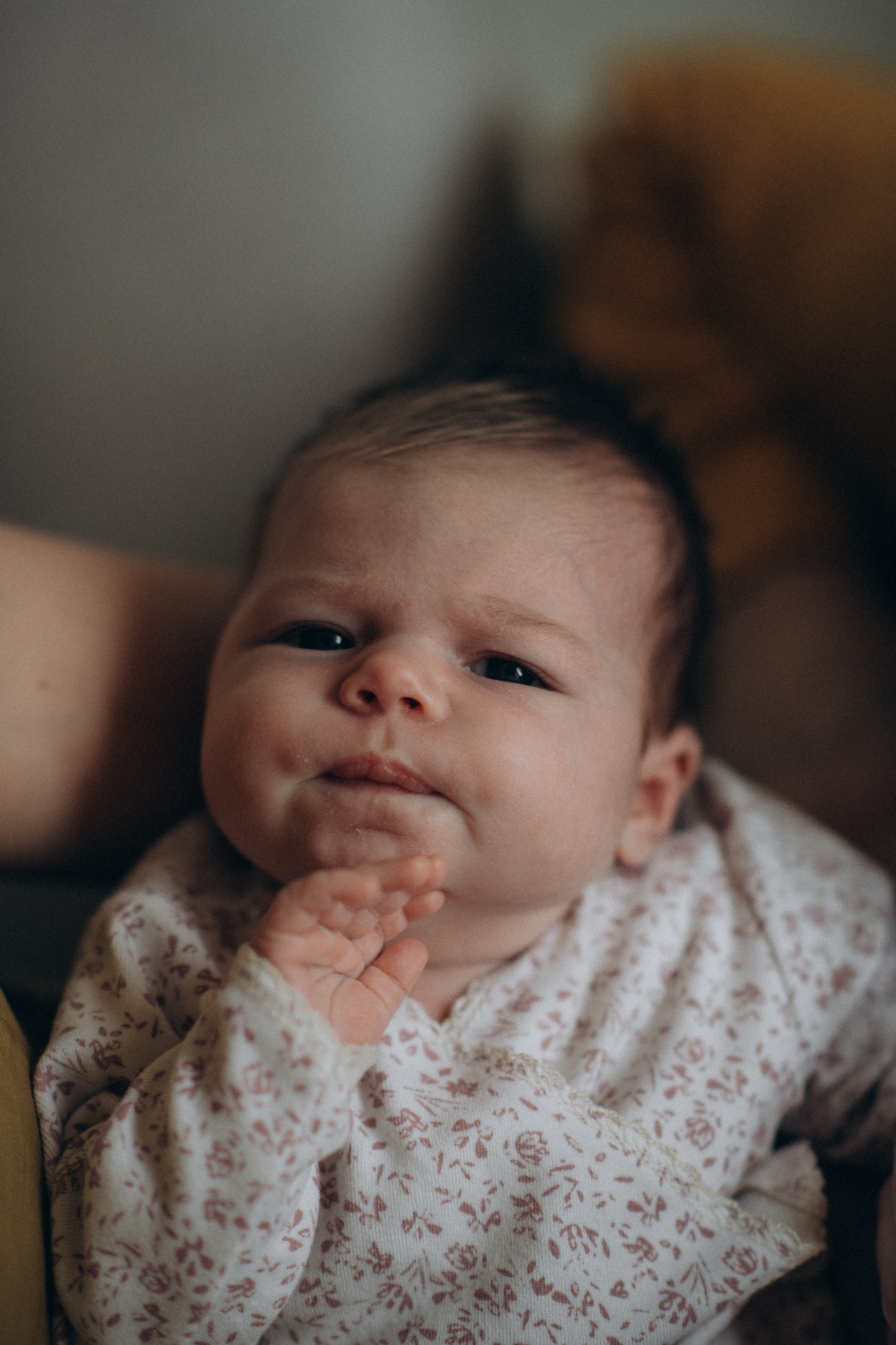 tiny baby makes funny face