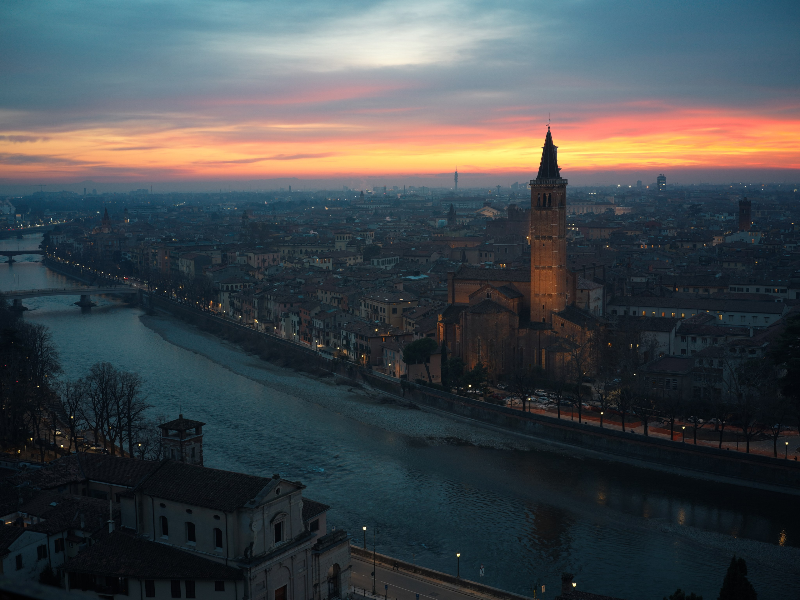Sunset panorama of Verona with Adige river and historic skyline
