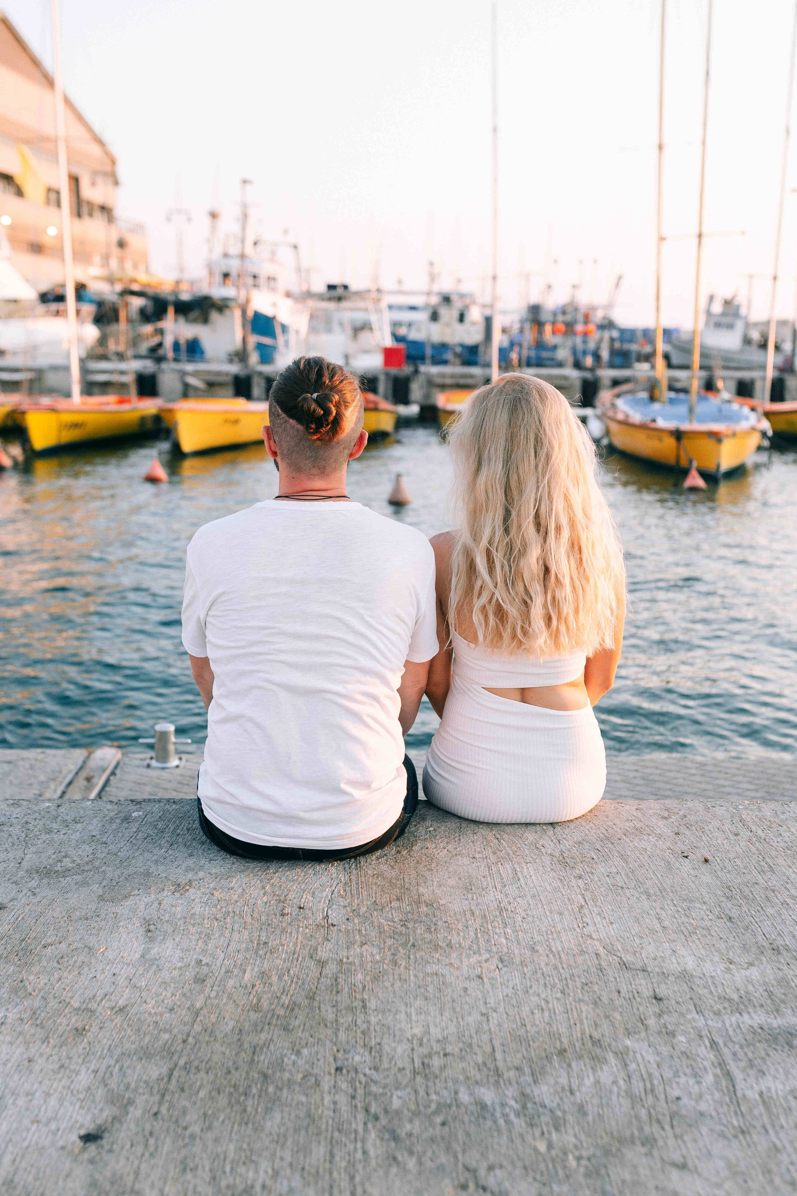 SUNSET IN JAFFO PORT. PHOTOGRAPHER IN ISRAEL