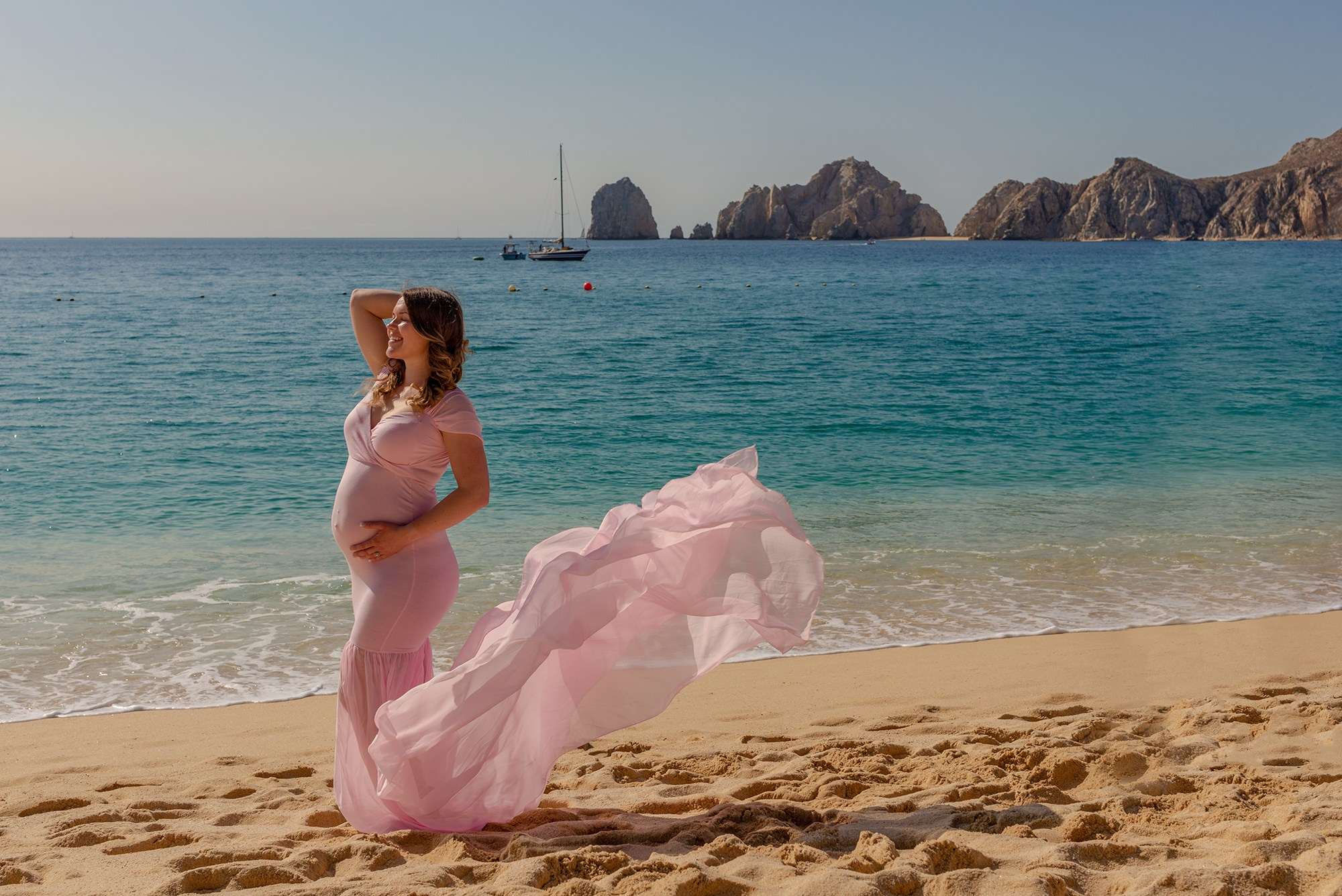 Maternity session in Los Cabos – profile portrait of expecting mother highlighting baby bump, photographed by destination maternity photographer in Baja California Sur