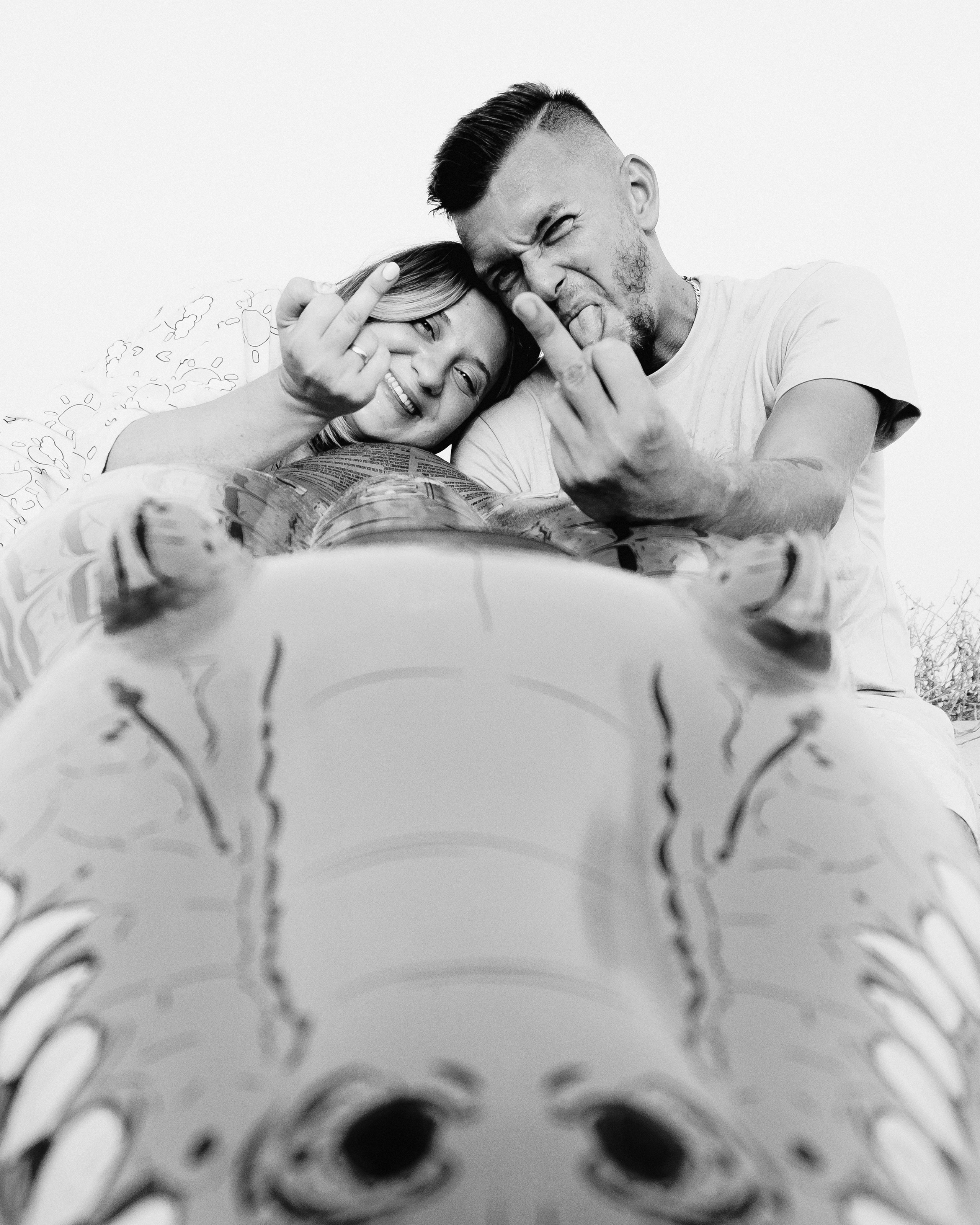 Crazy love story on the beach with an inflatable crocodile