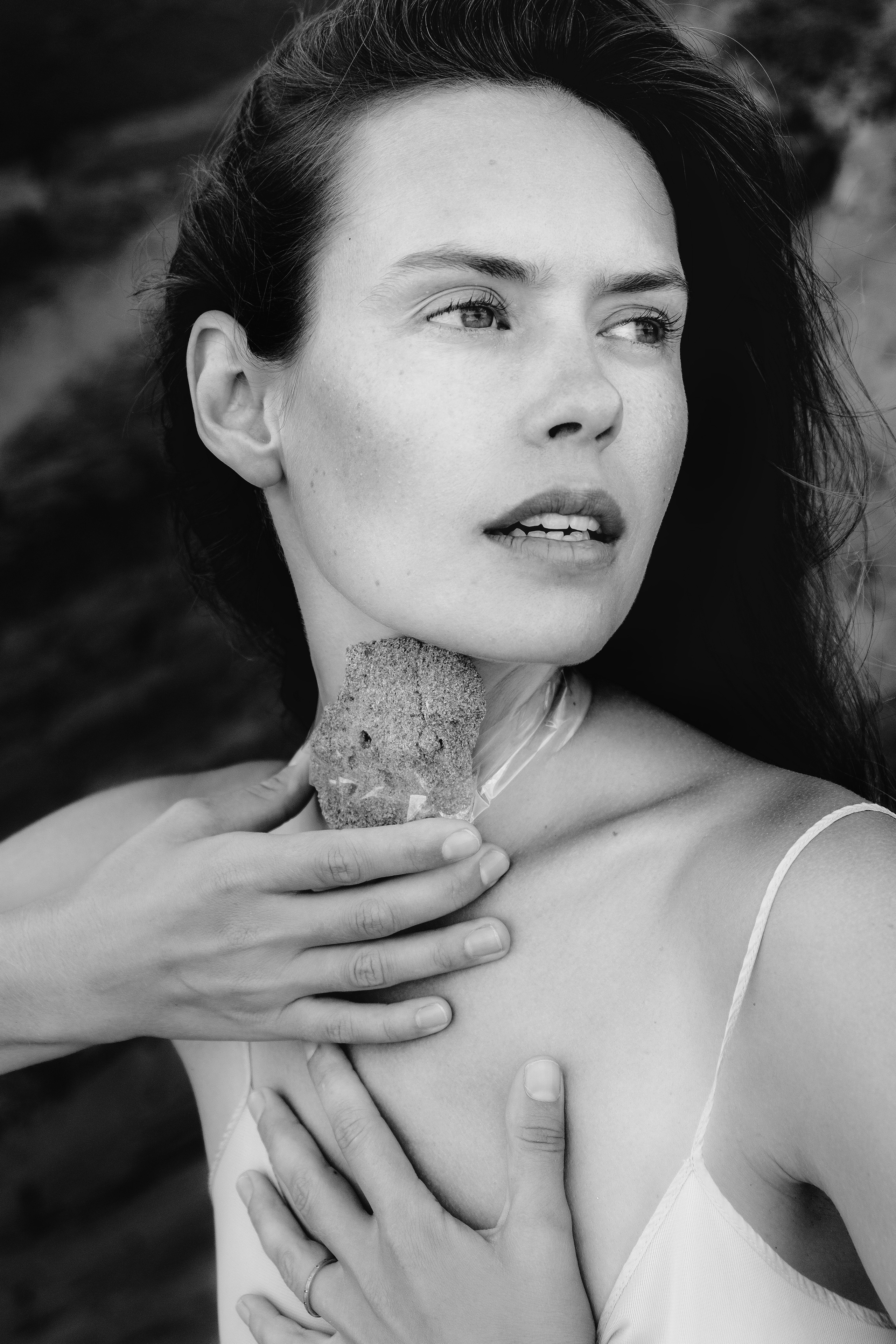 Conceptual photo session on a rocky beach