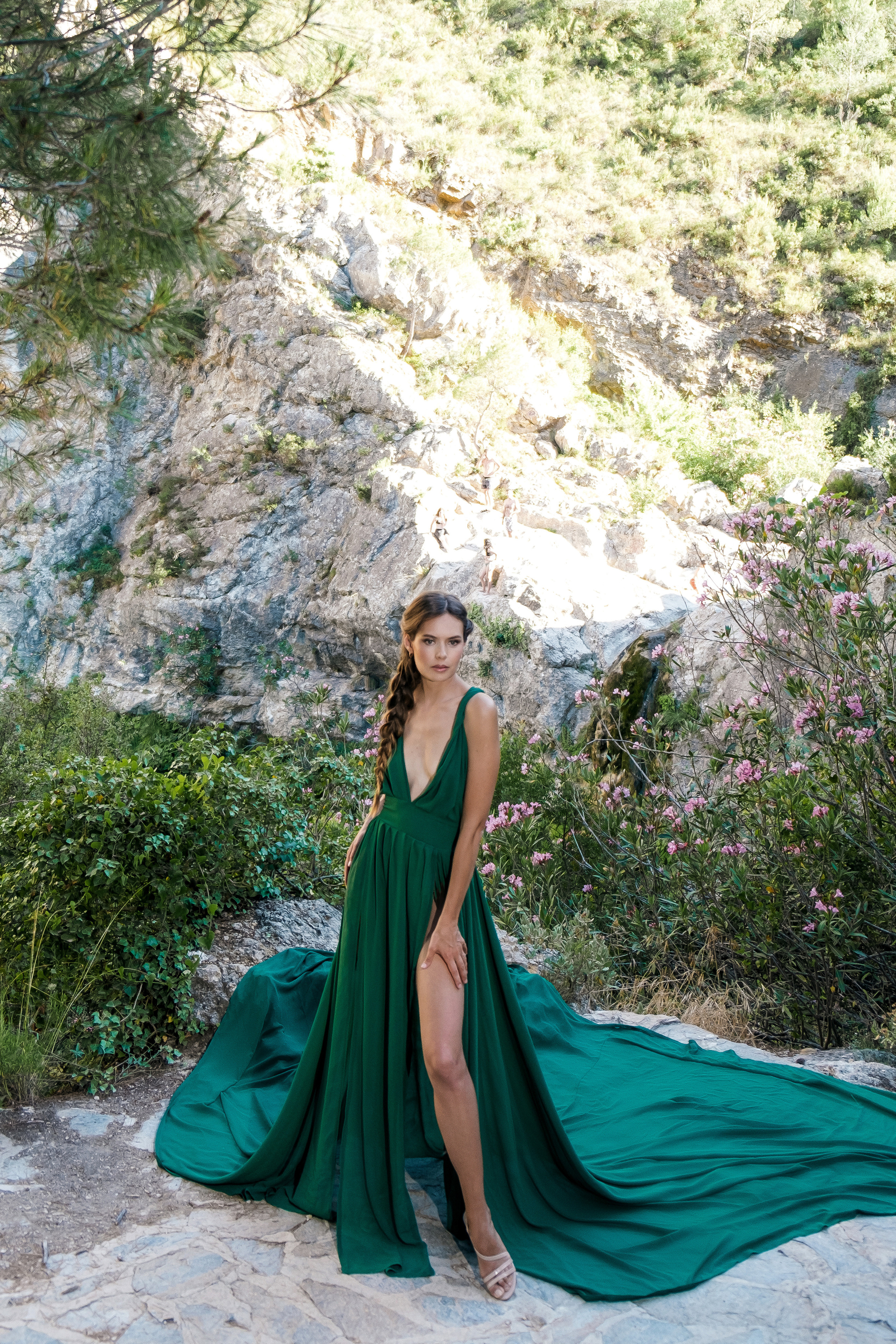 Photoshoot in evening colored dresses by the waterfall
