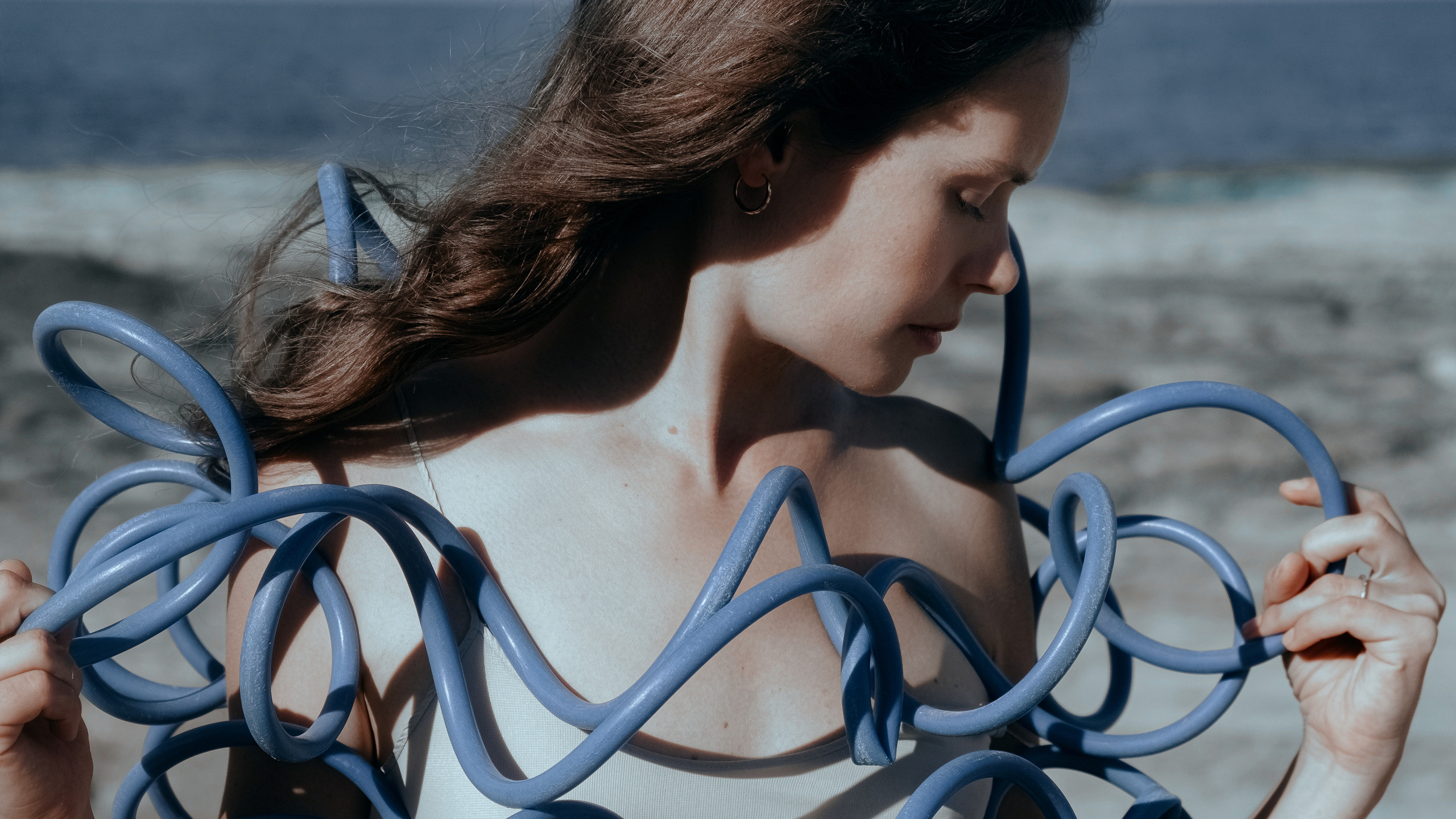 Conceptual photo session on a rocky beach